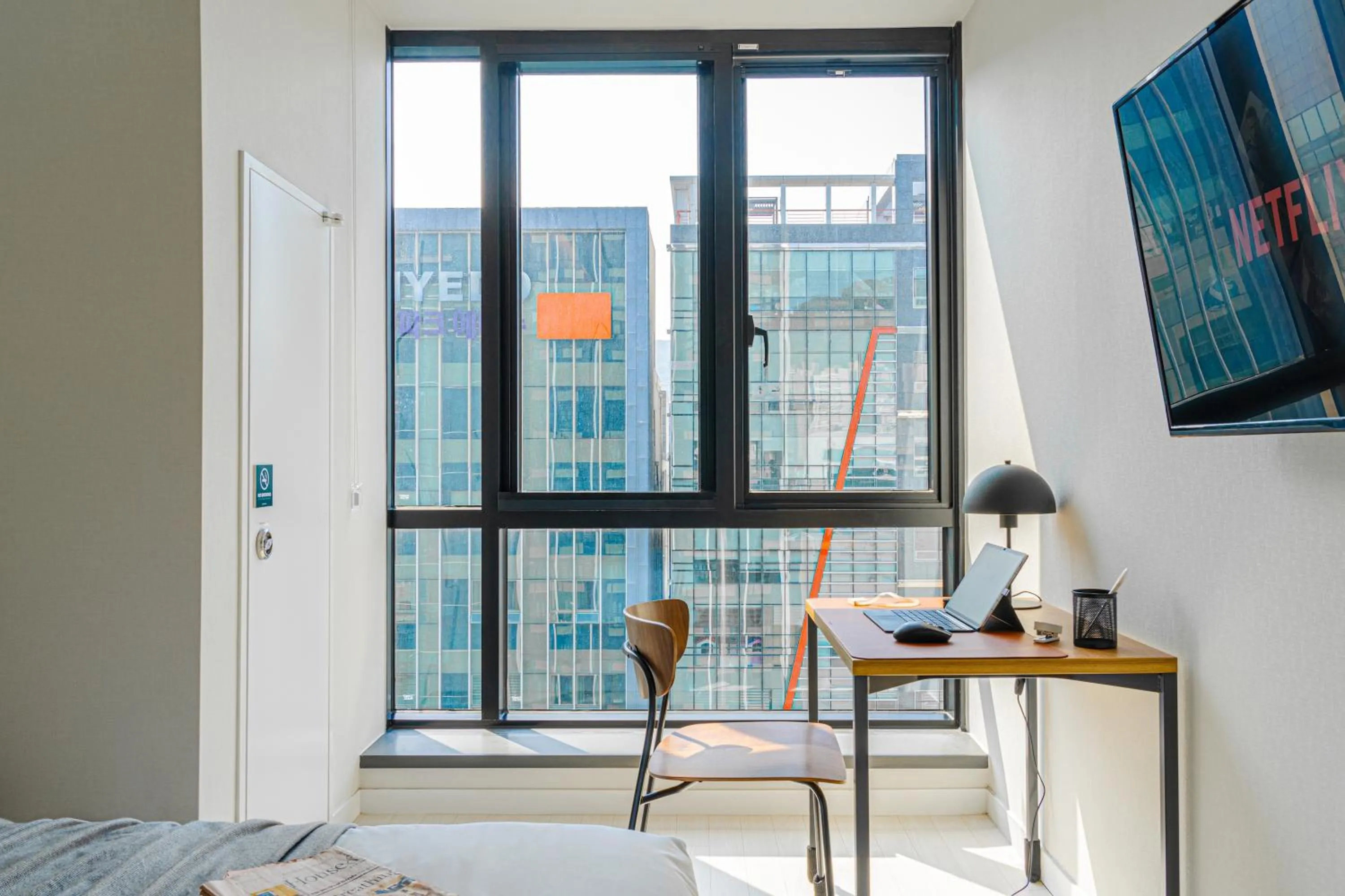 Dining area, Bed in Urbanstay Seomyeon