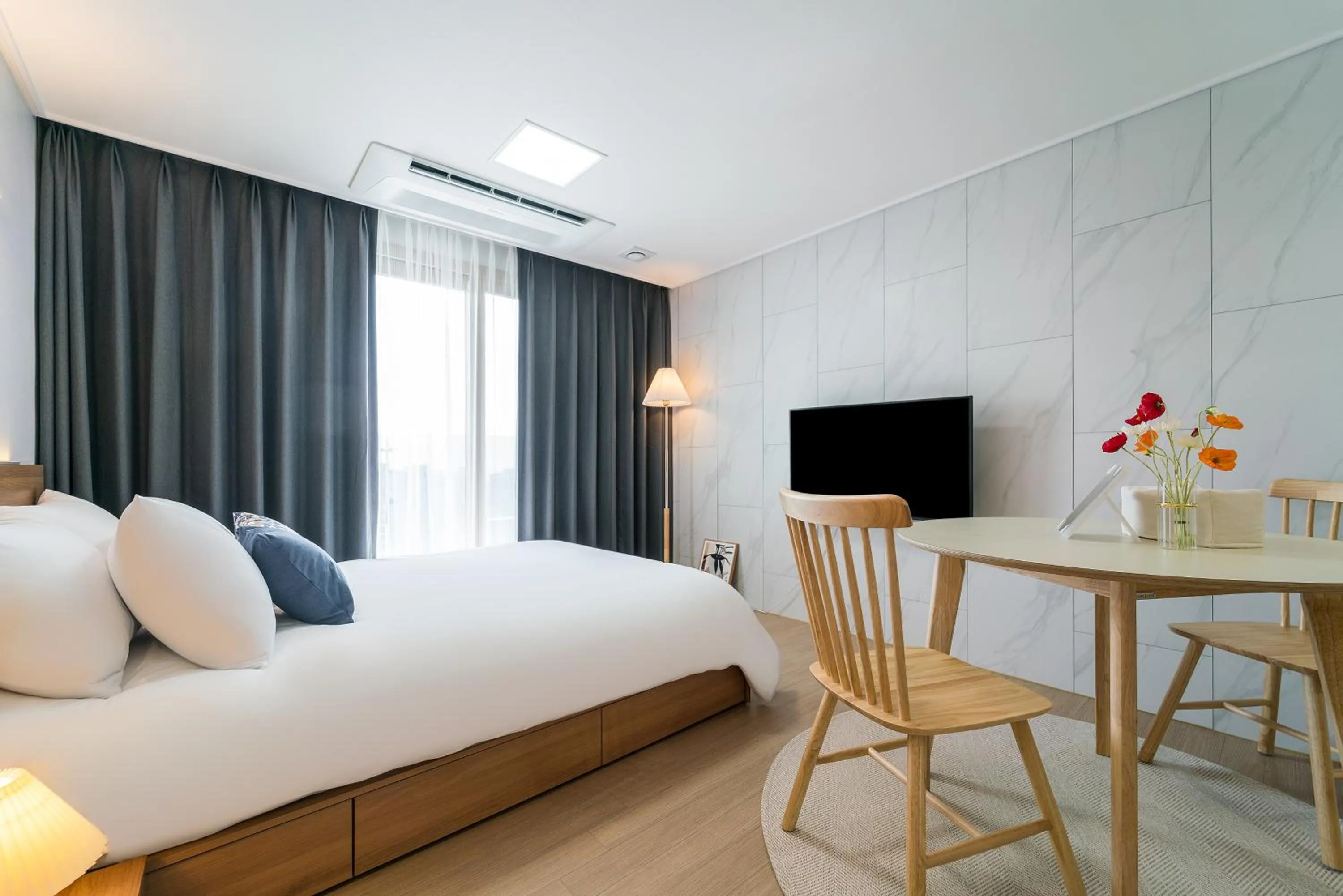 Bed in Urbanstay Jeju Airport