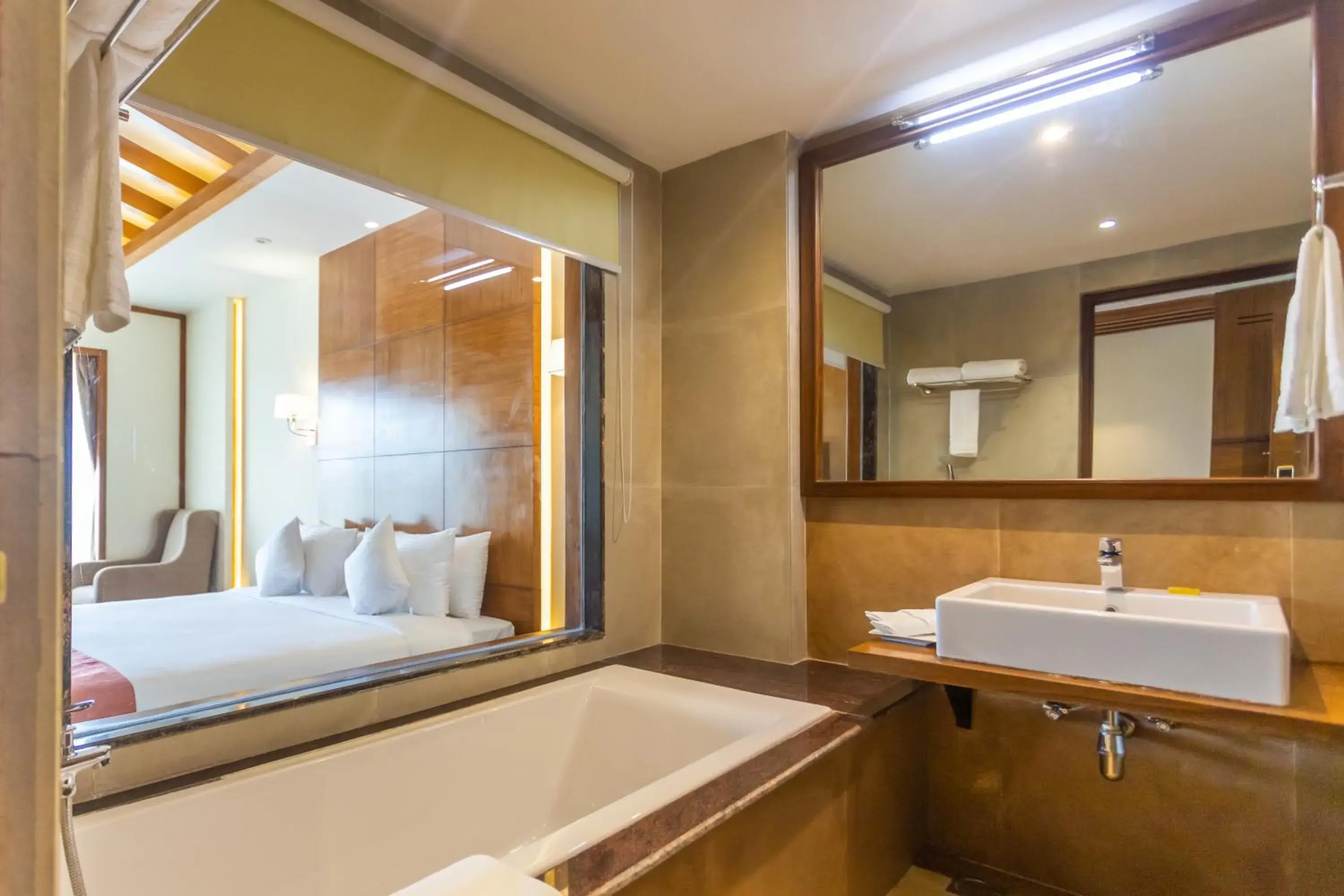 Bathroom, Bed in Soaltee Westend Resort Chitwan Bathroom, Bed in Soaltee Westend Resort Chitwan