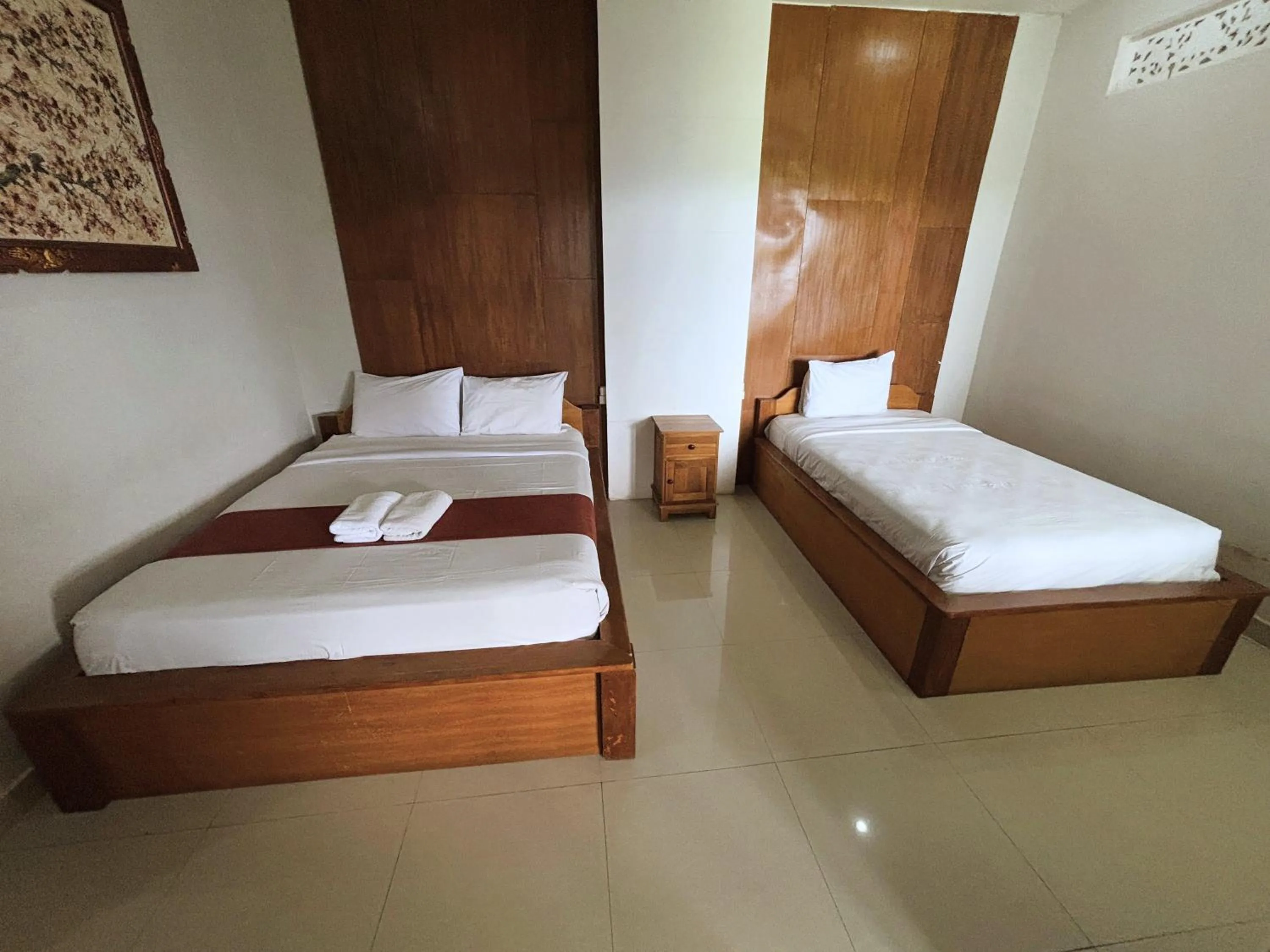 Bed in Caldera Hotel & Restaurant