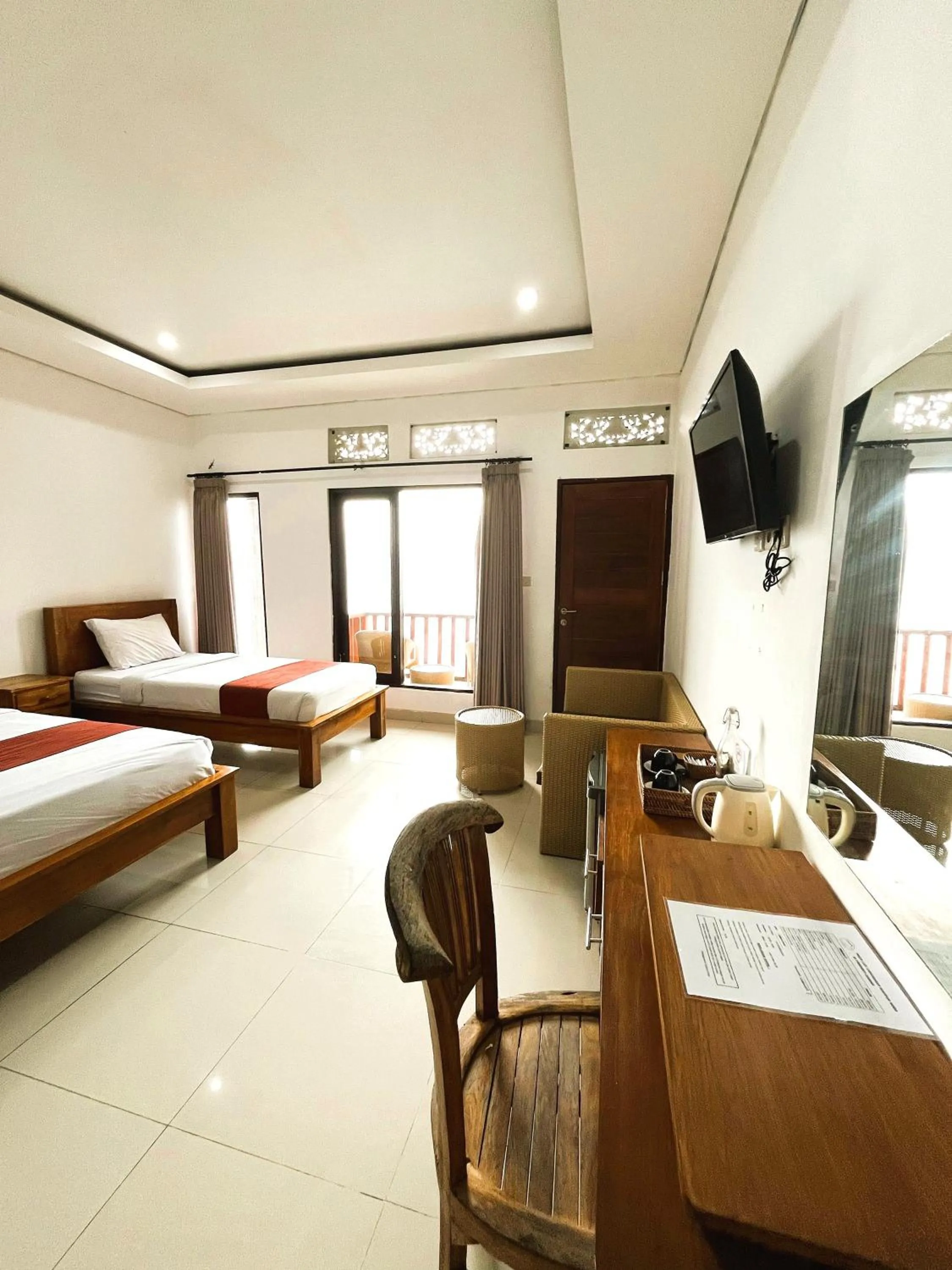 Bed in Caldera Hotel & Restaurant