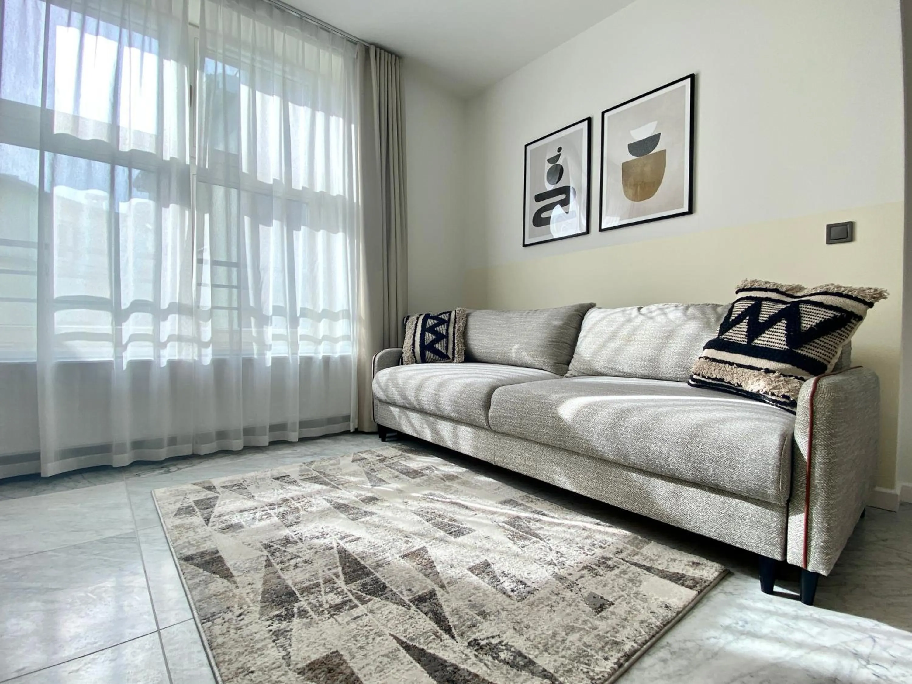 Seating area, Bed in H11 Aparthotel