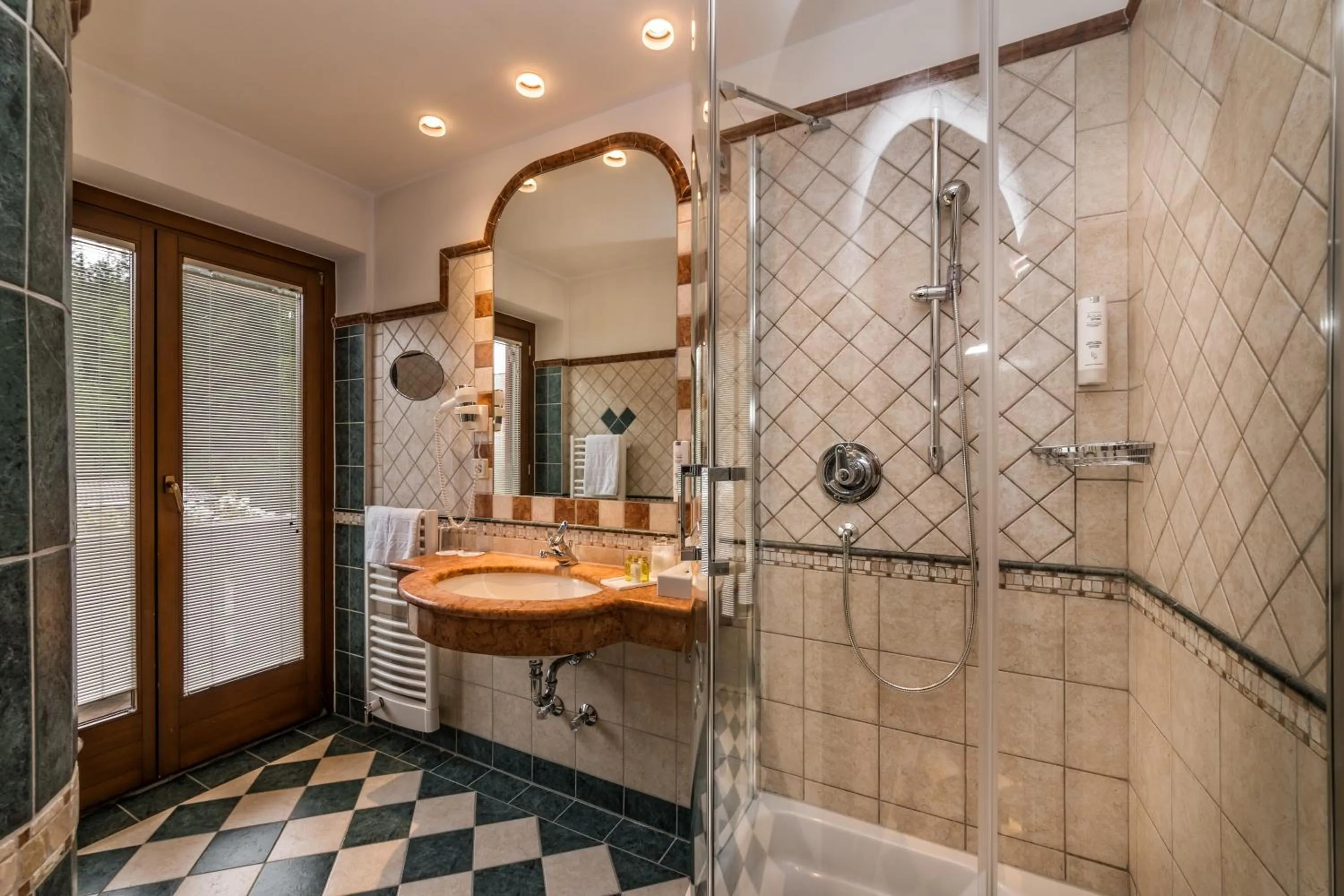 Bathroom in Romantik Hotel Santer