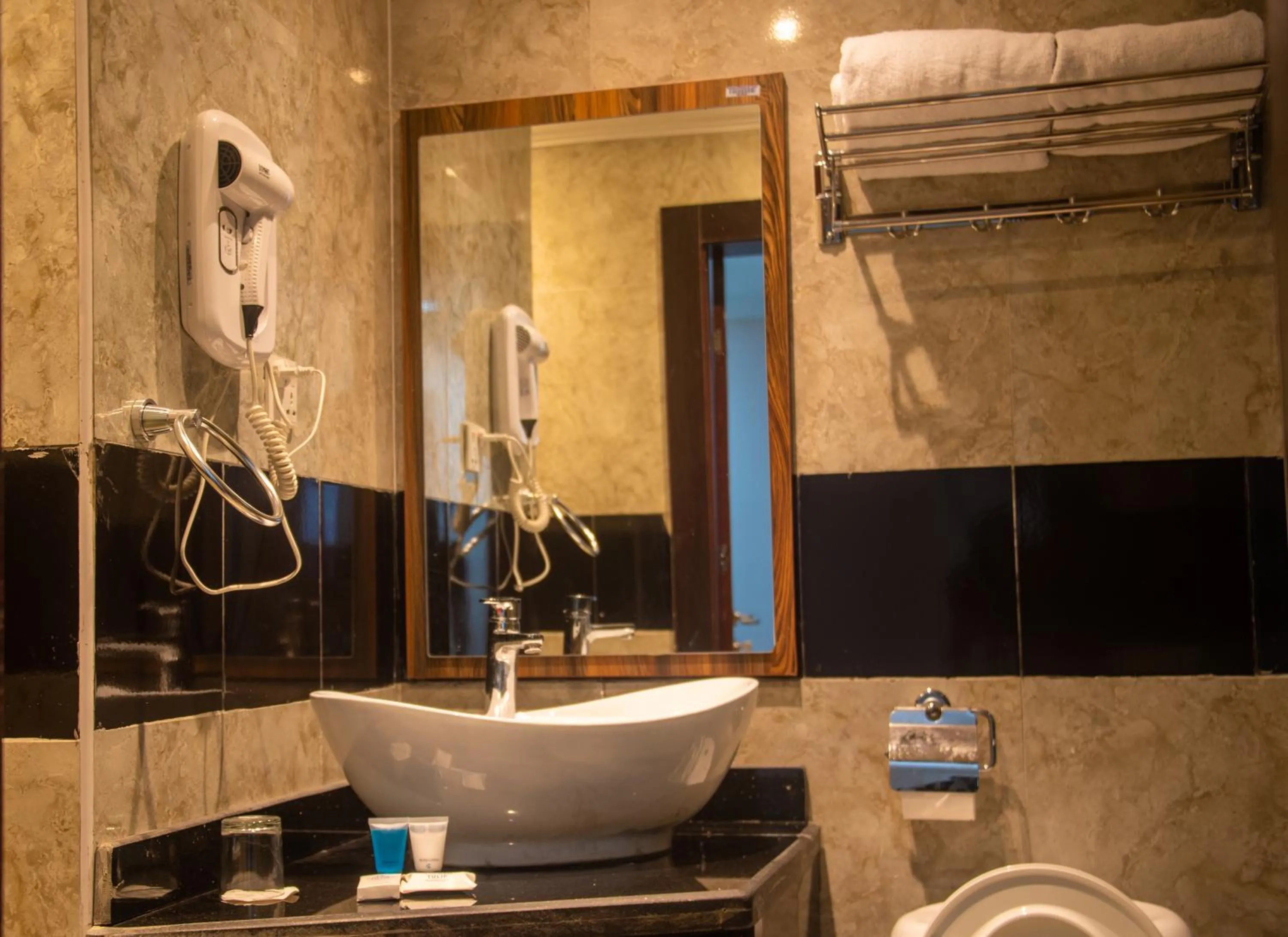 Shower in Golden Tulip Garden City Hotel - Rivotel