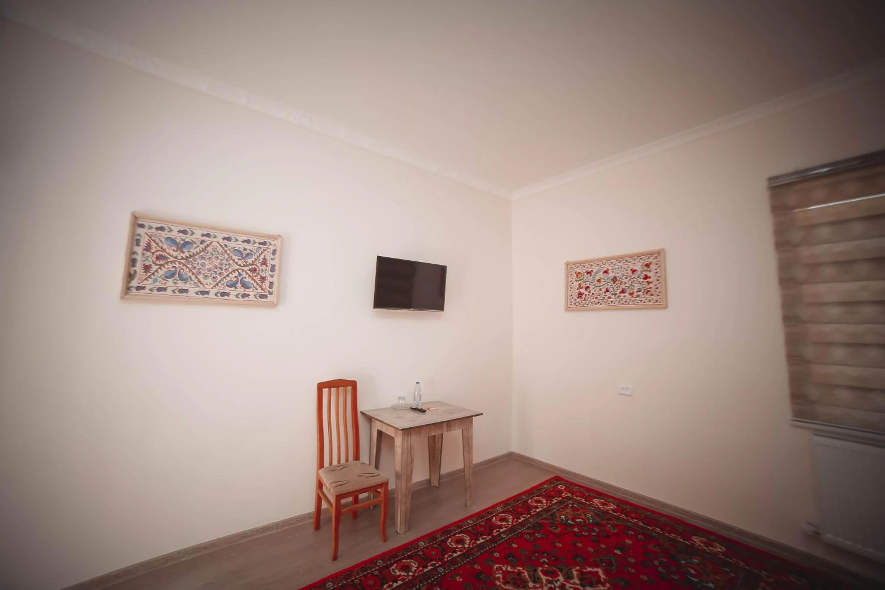Quadruple Room - single occupancy in Oqilanur Guest House