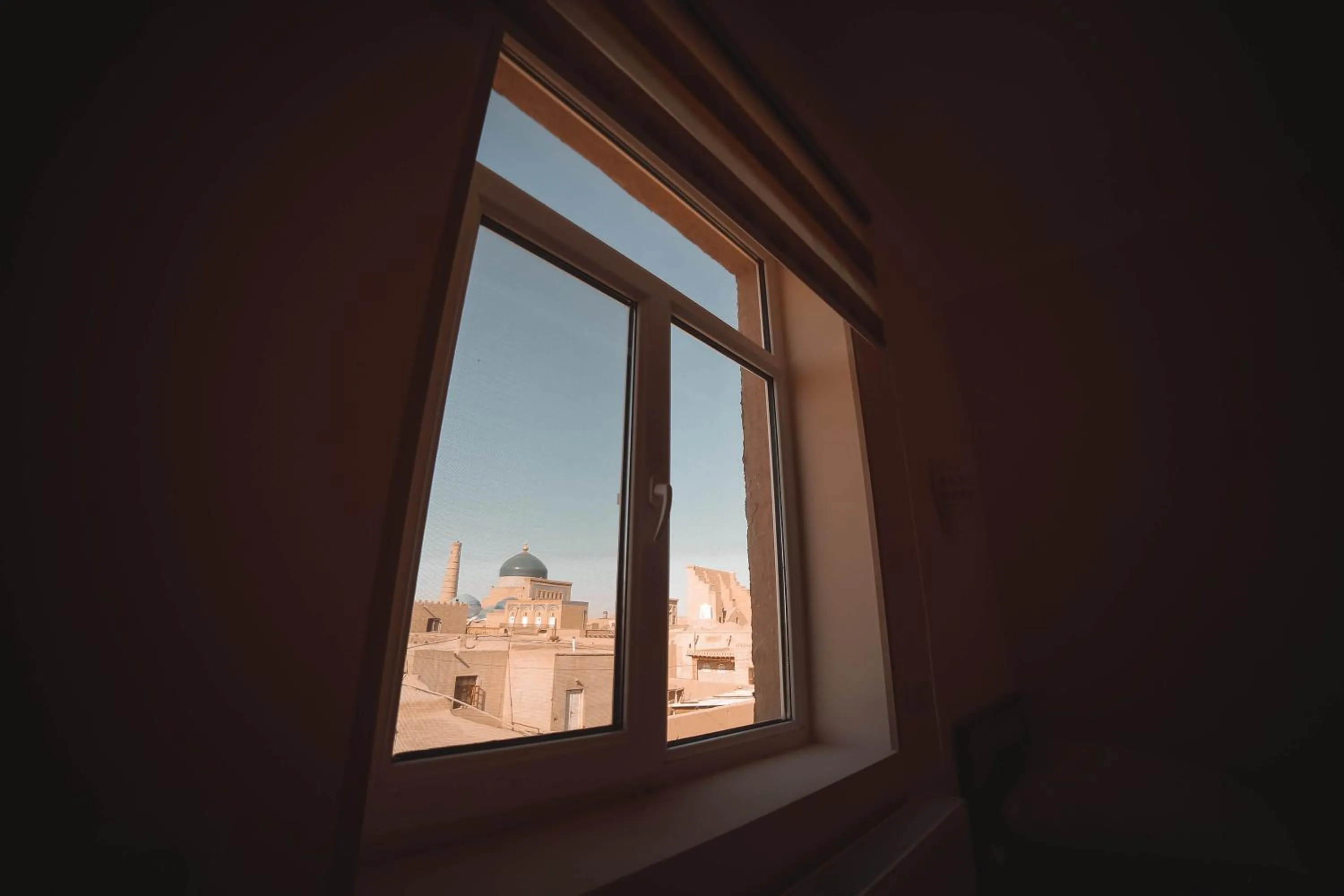Quadruple Room - single occupancy in Oqilanur Guest House