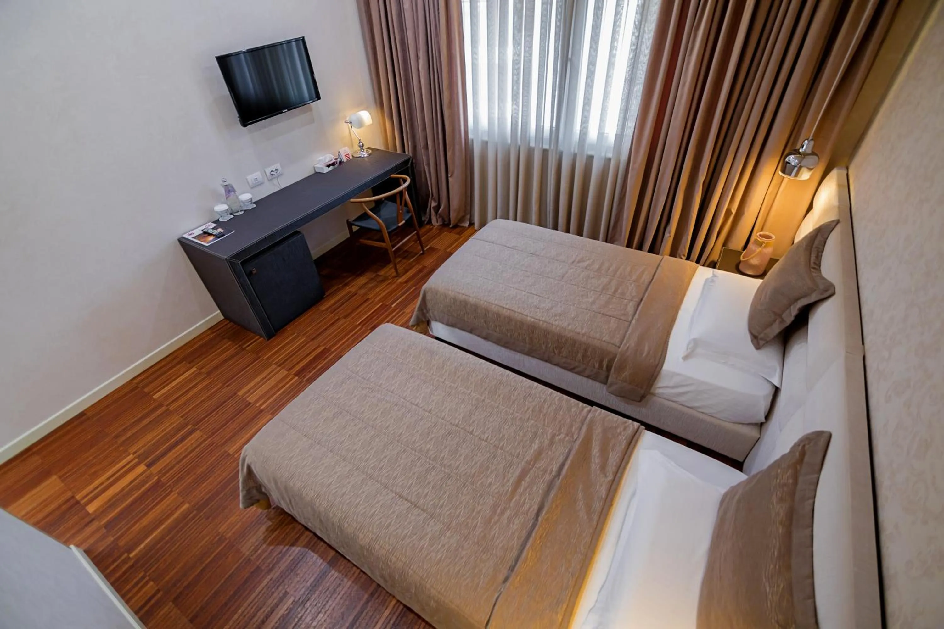 Bedroom in La Bohème Hotel