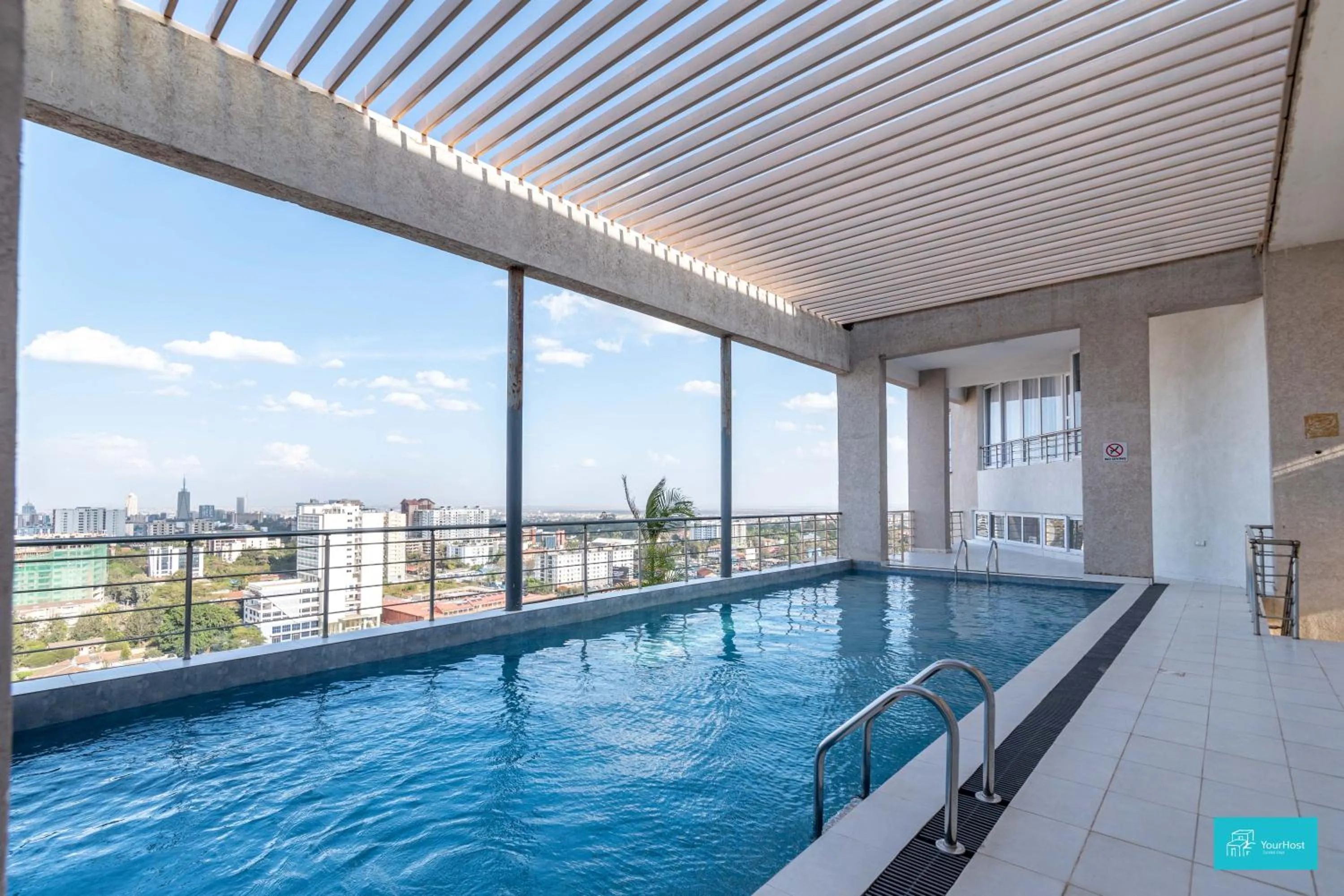 Pool view in Imagine Luxe Bohemian by YourHost