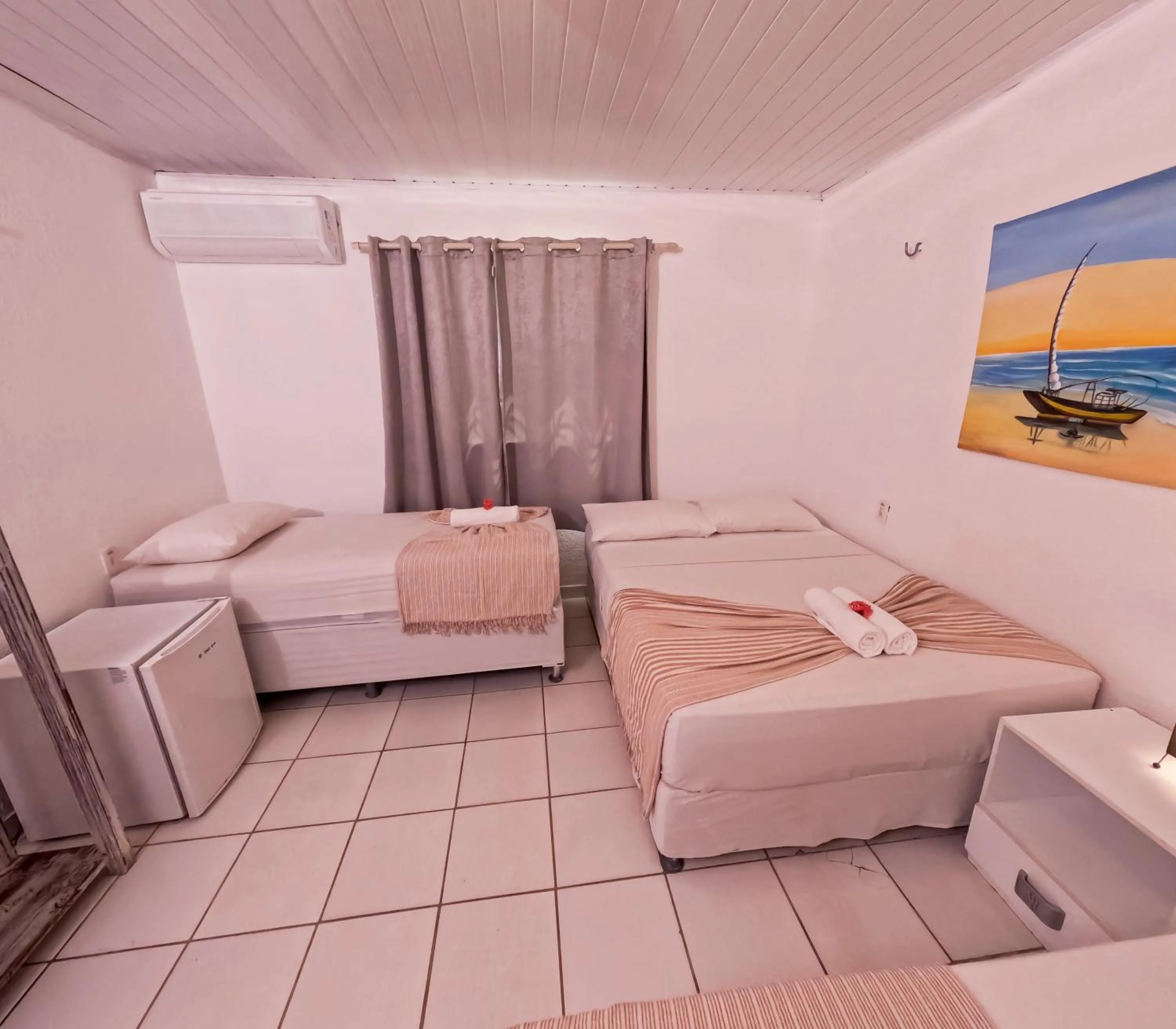 Bed in Pousada Hippopotamus Jeri