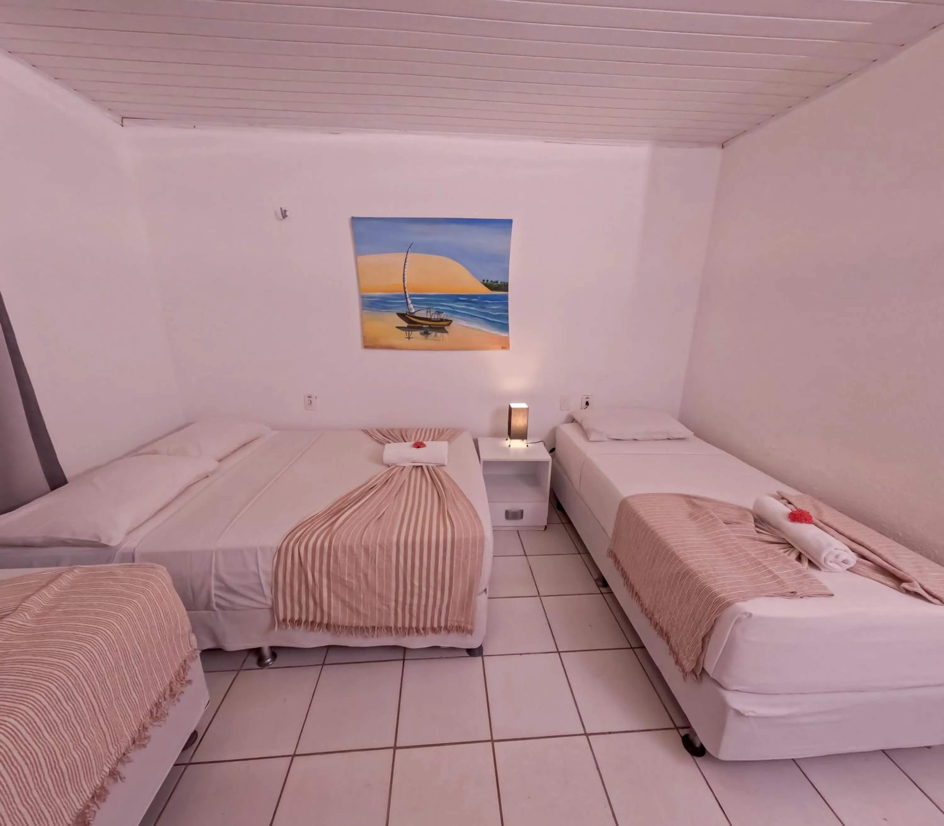 Bed in Pousada Hippopotamus Jeri