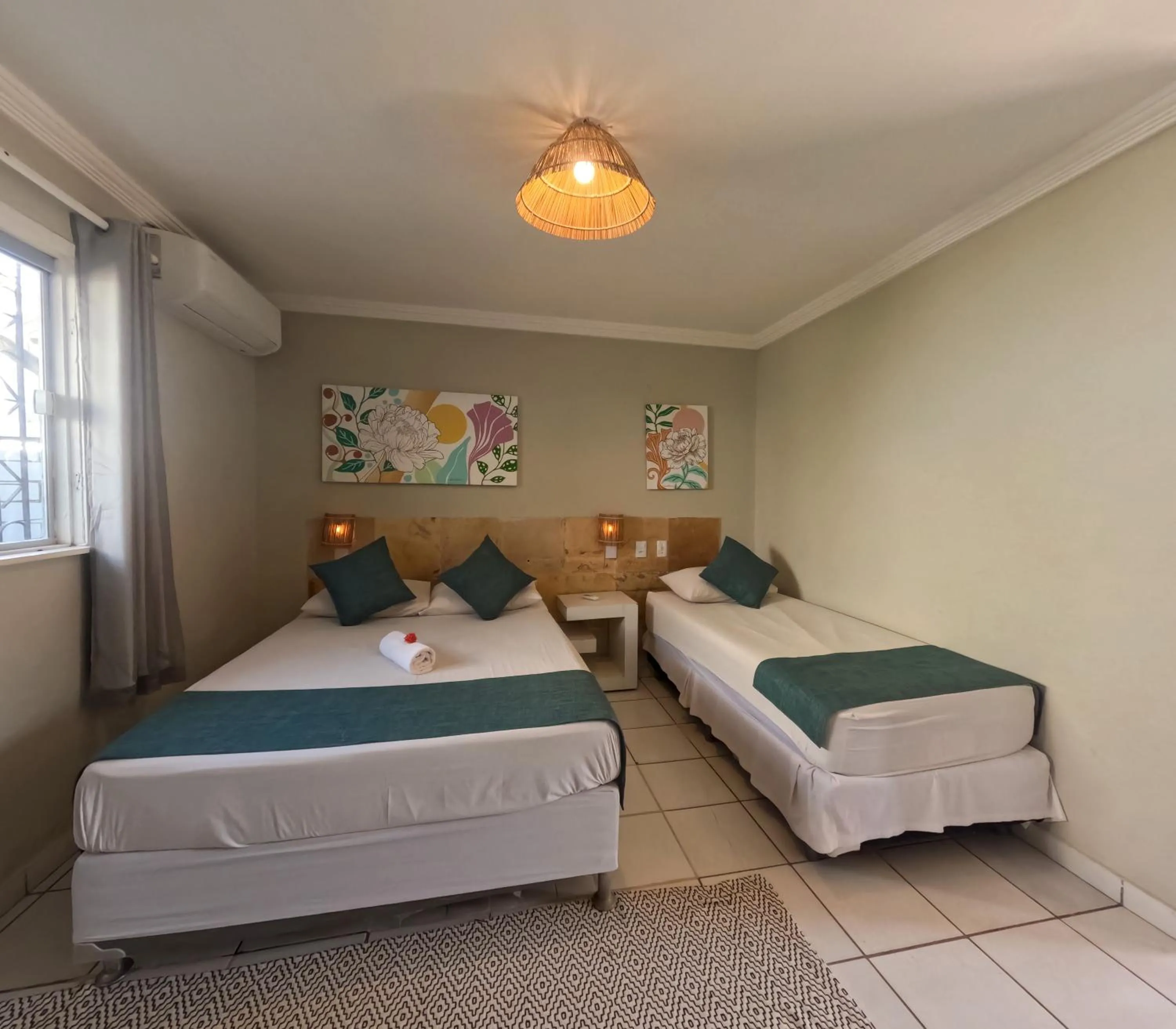 Bed in Pousada Hippopotamus Jeri