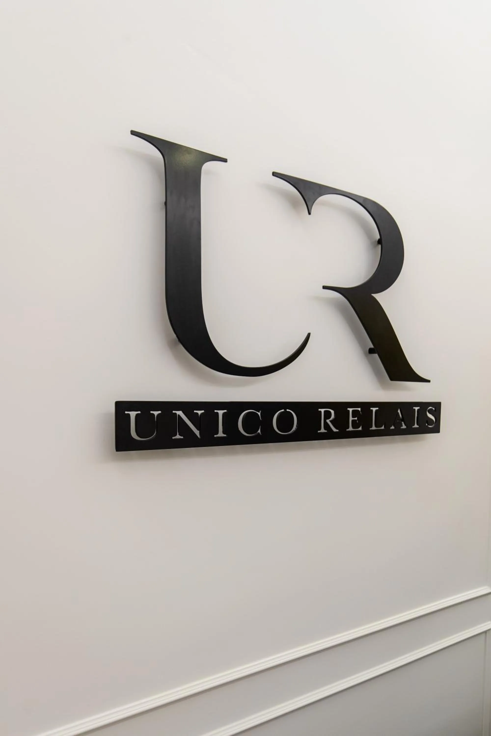Property logo or sign in Unico Relais