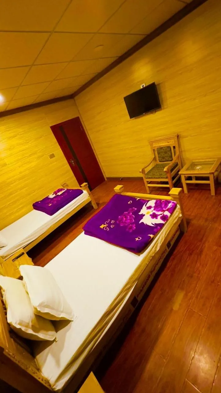 Bed in Gems Palace Hotel Sost