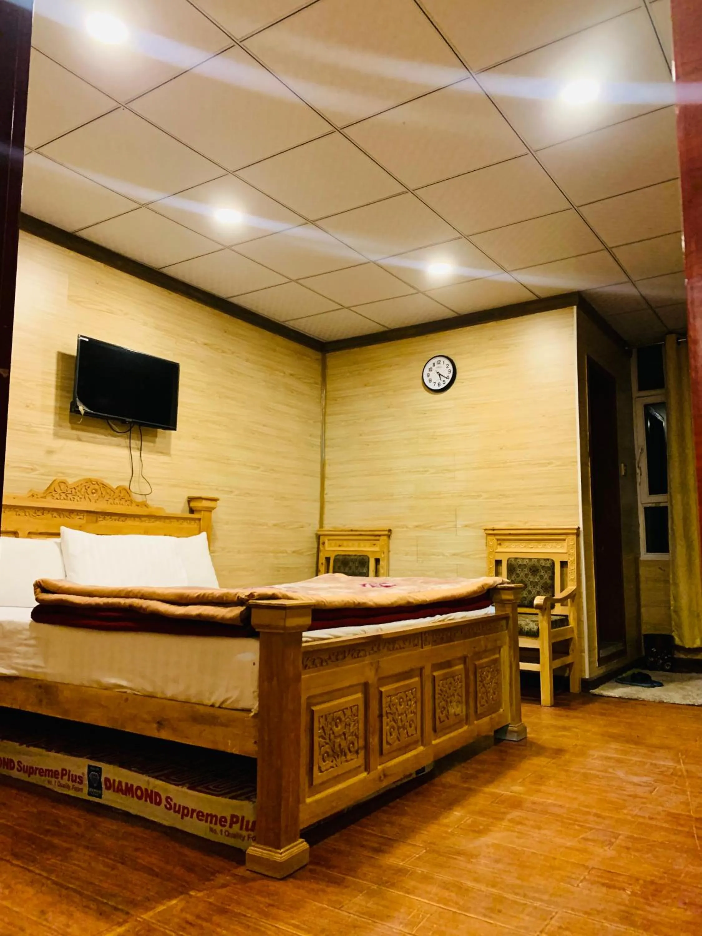 Bed in Gems Palace Hotel Sost