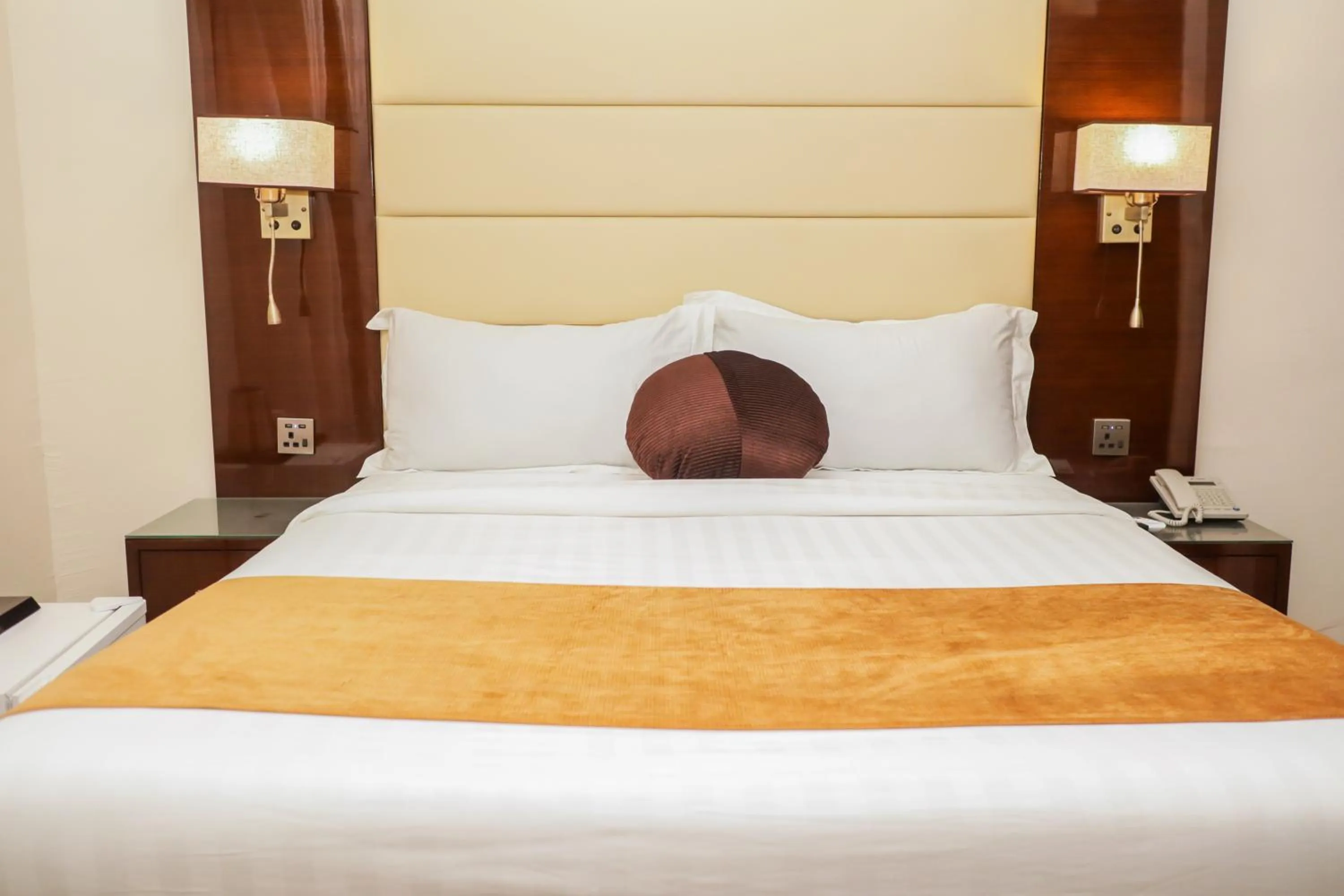 Bed in De Rembrandt Classic Hotel