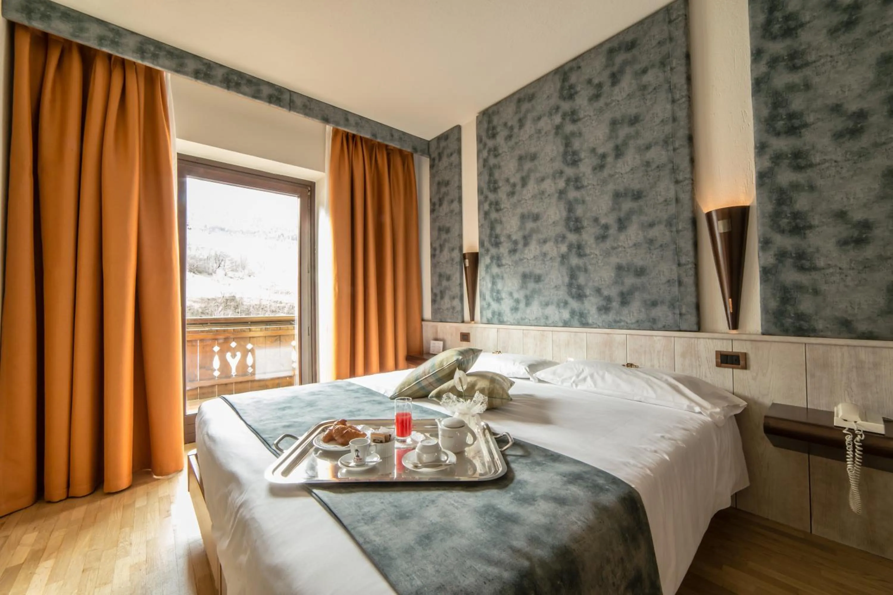 Bed in Hotel Comtes De Challant Albergo Etico Valle d'Aosta