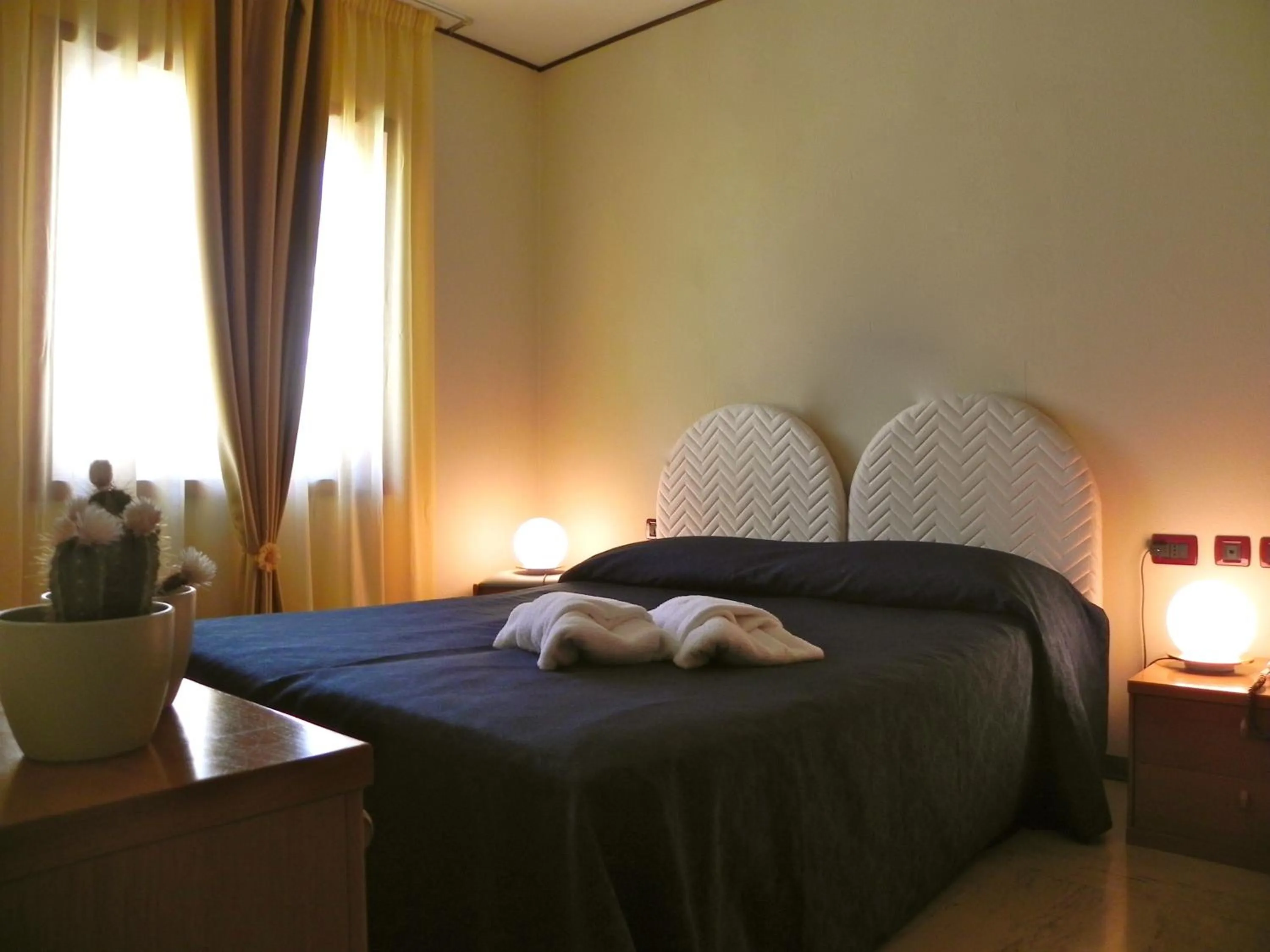 Bed in Torreata Hotel & Residence