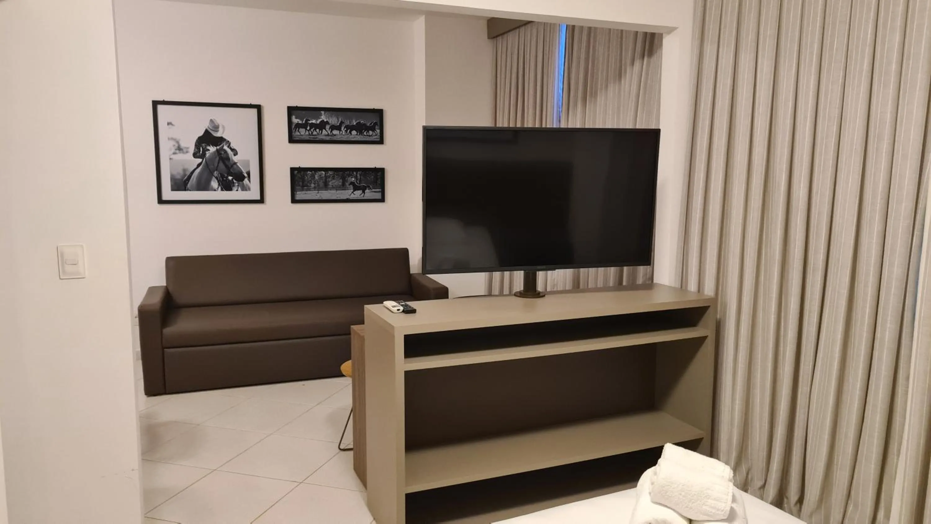 Communal lounge/ TV room in Condomínio Barretos Thermas Park - Flat Parque do Peão