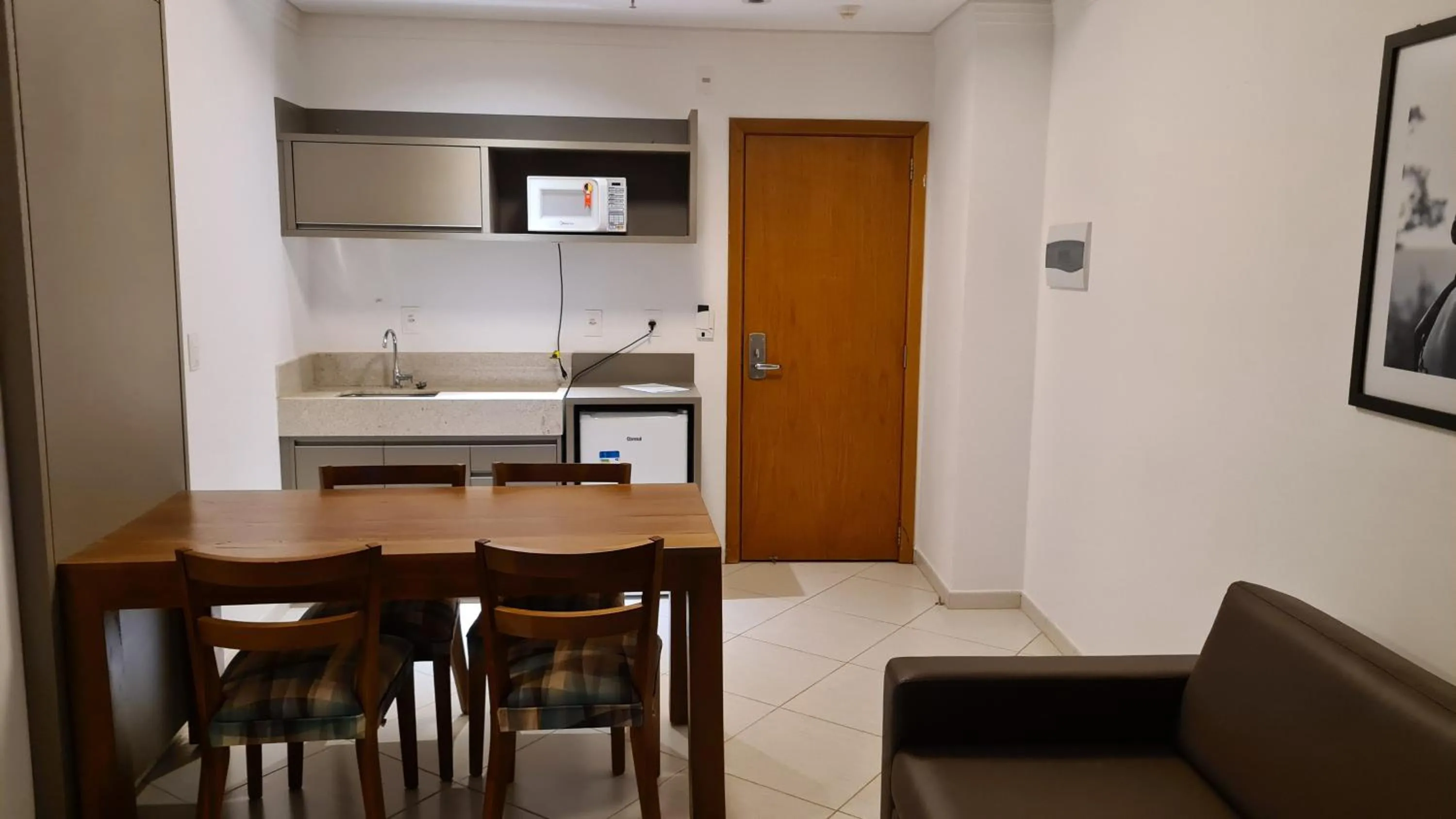 Kitchen or kitchenette in Condomínio Barretos Thermas Park - Flat Parque do Peão