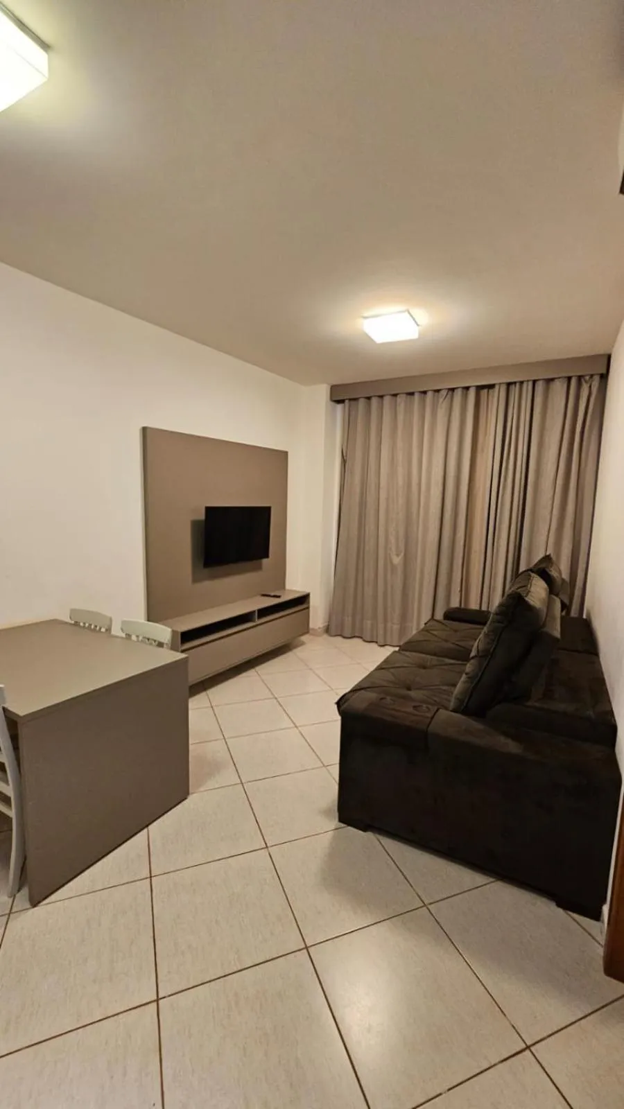 Living room, Bed in Condomínio Barretos Thermas Park - Flat Parque do Peão