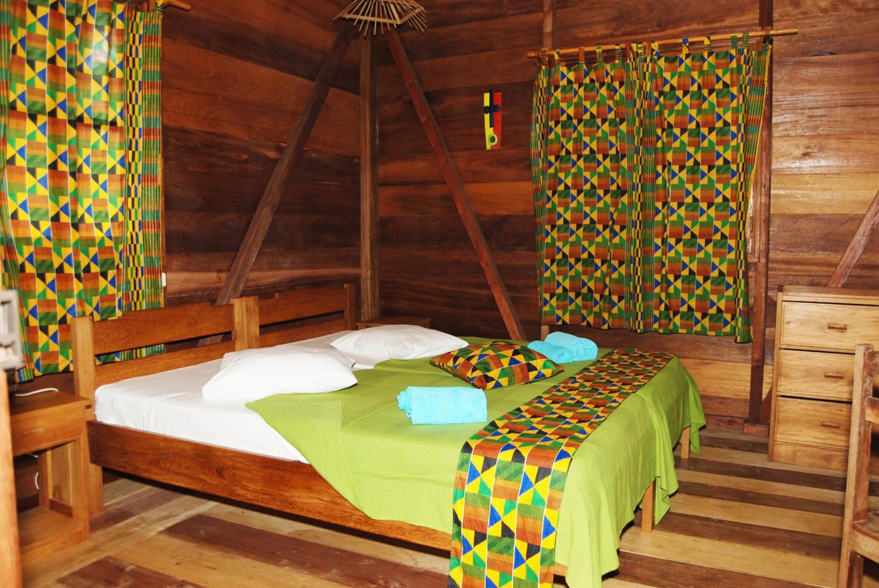 Bed in Hotel Praia Inhame Ecolodge