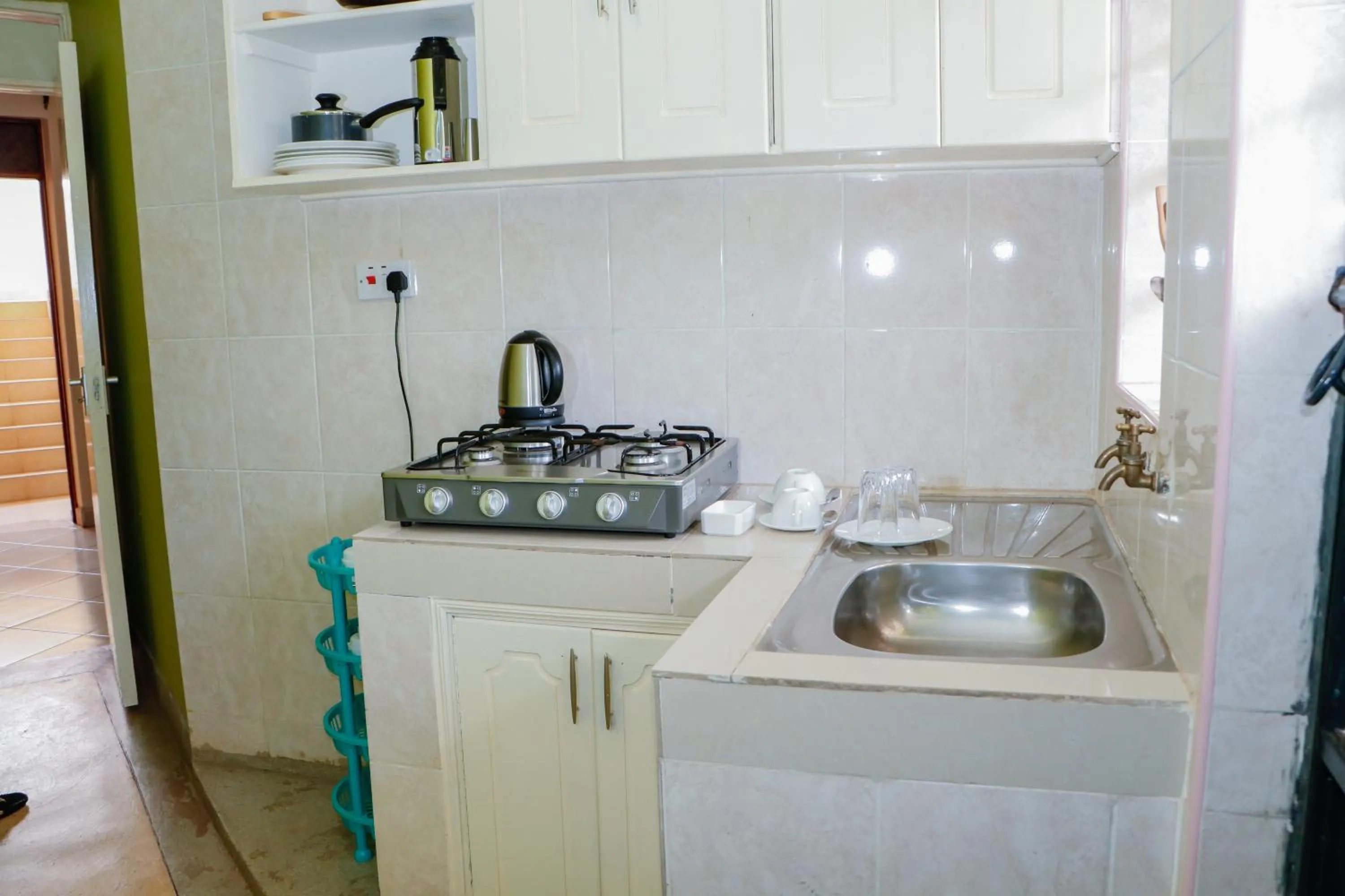 Kitchen or kitchenette in The Kyaka Hotel