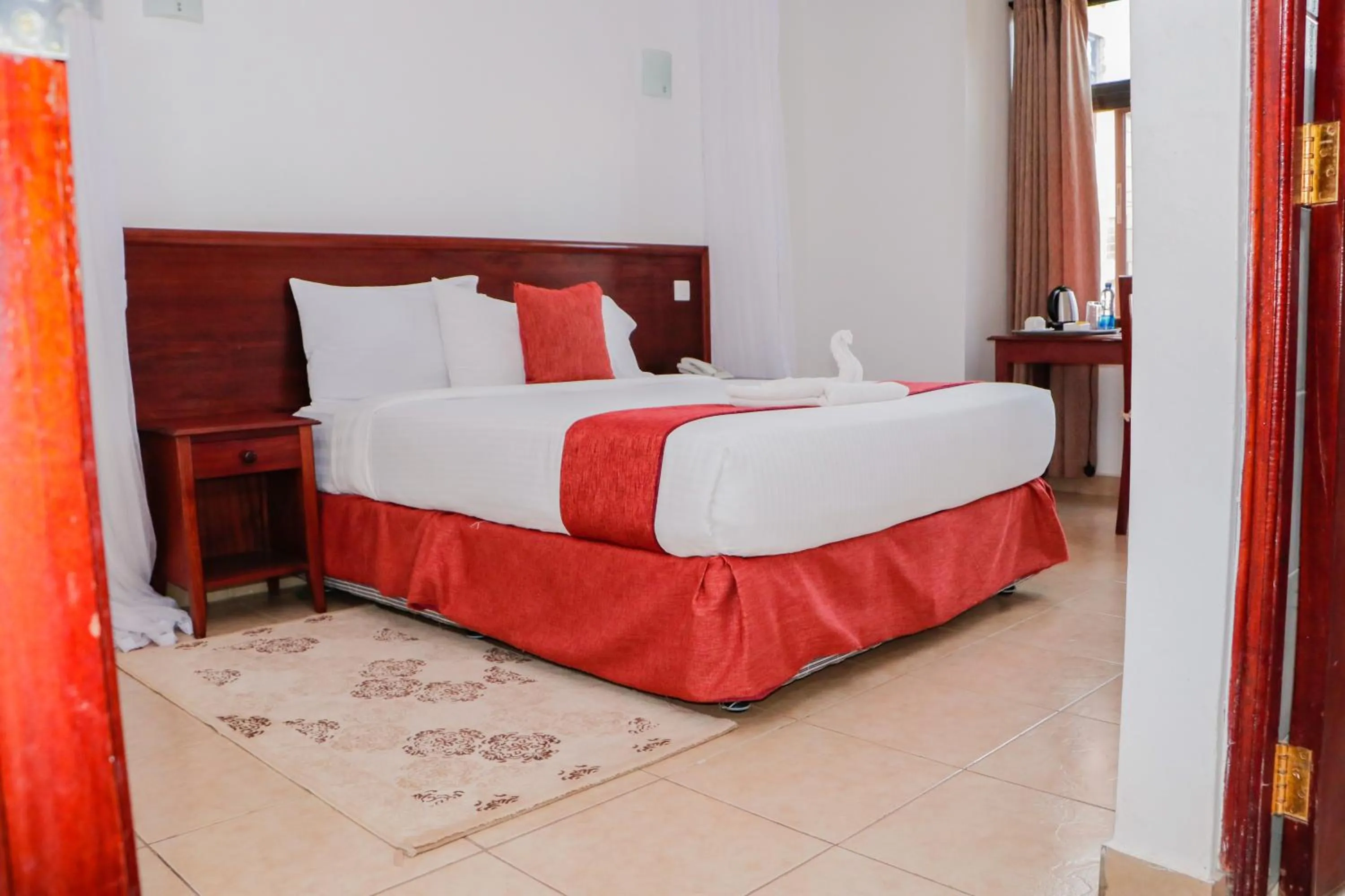 Bed in The Kyaka Hotel