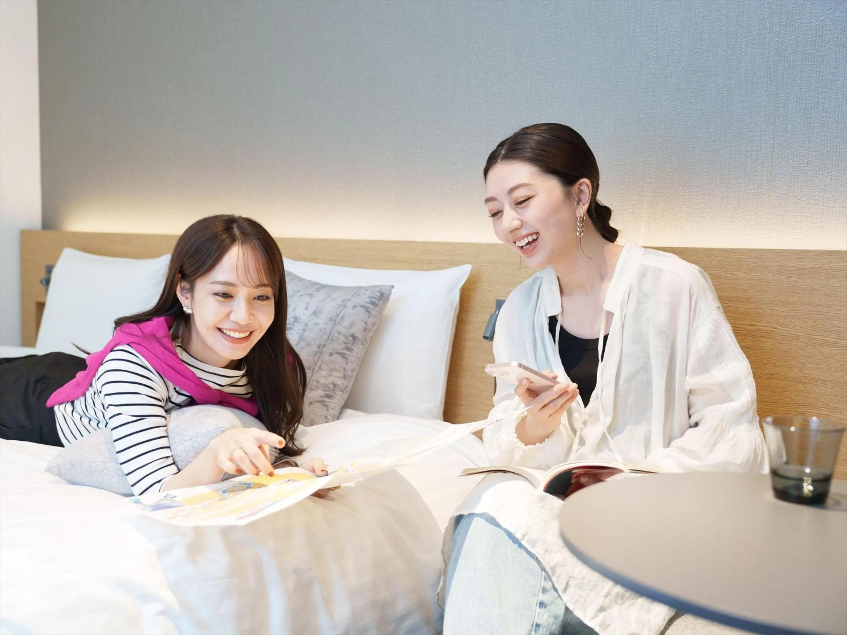 People, Bed in CROSS Life Hakata Yanagibashi