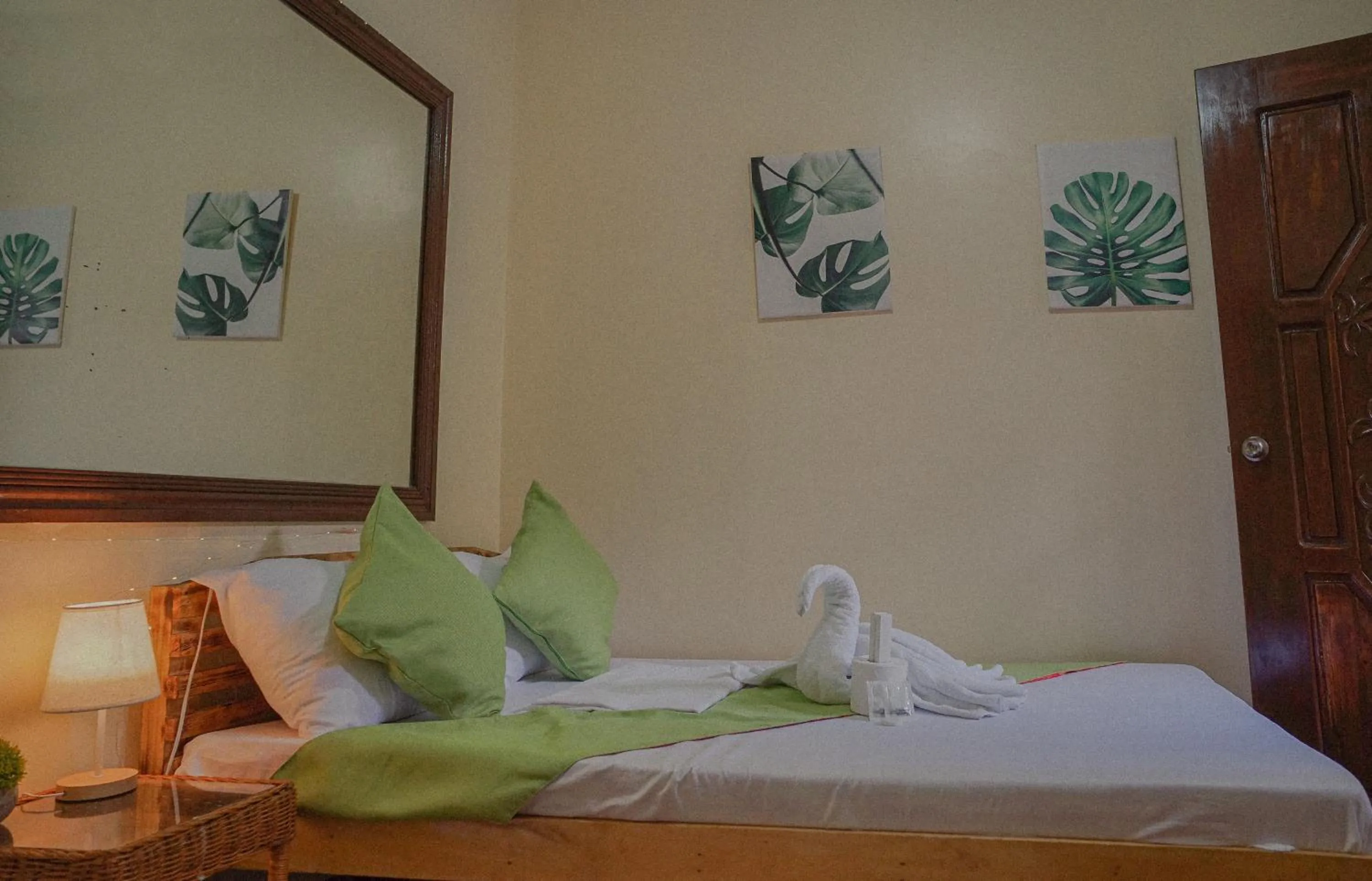 Bed in The Palms Resort & Bar