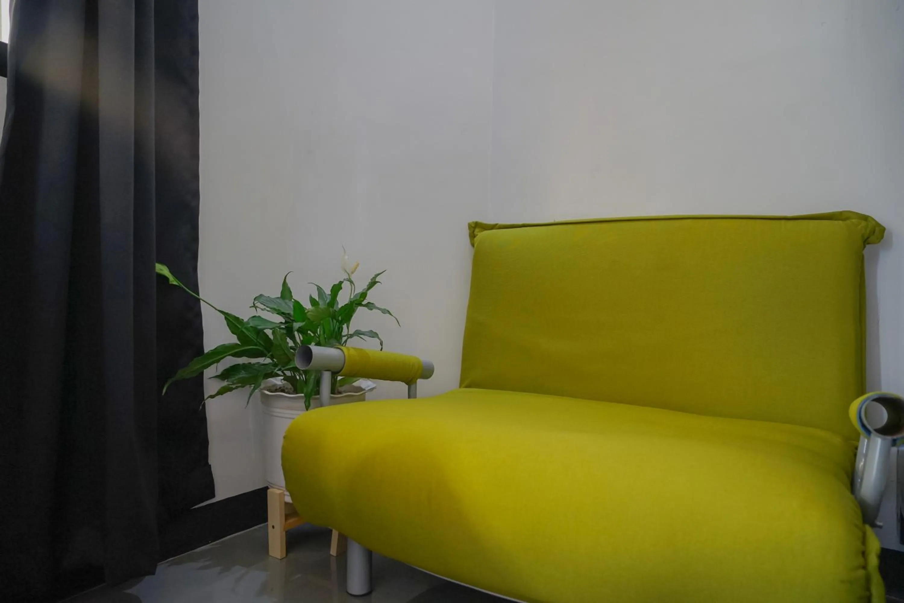 Bed in The Palms Resort & Bar