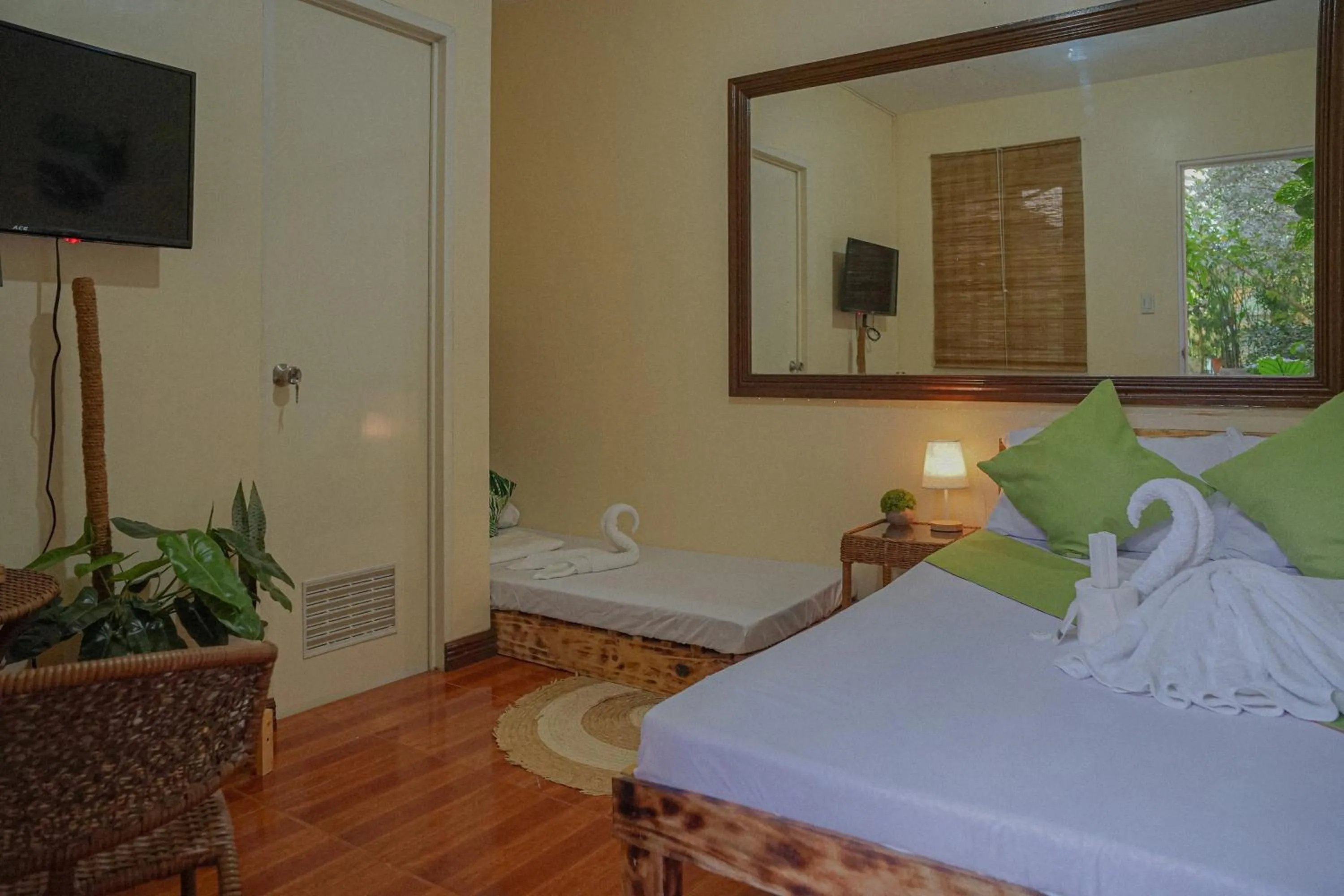 Photo of the whole room, Bed in The Palms Resort & Bar