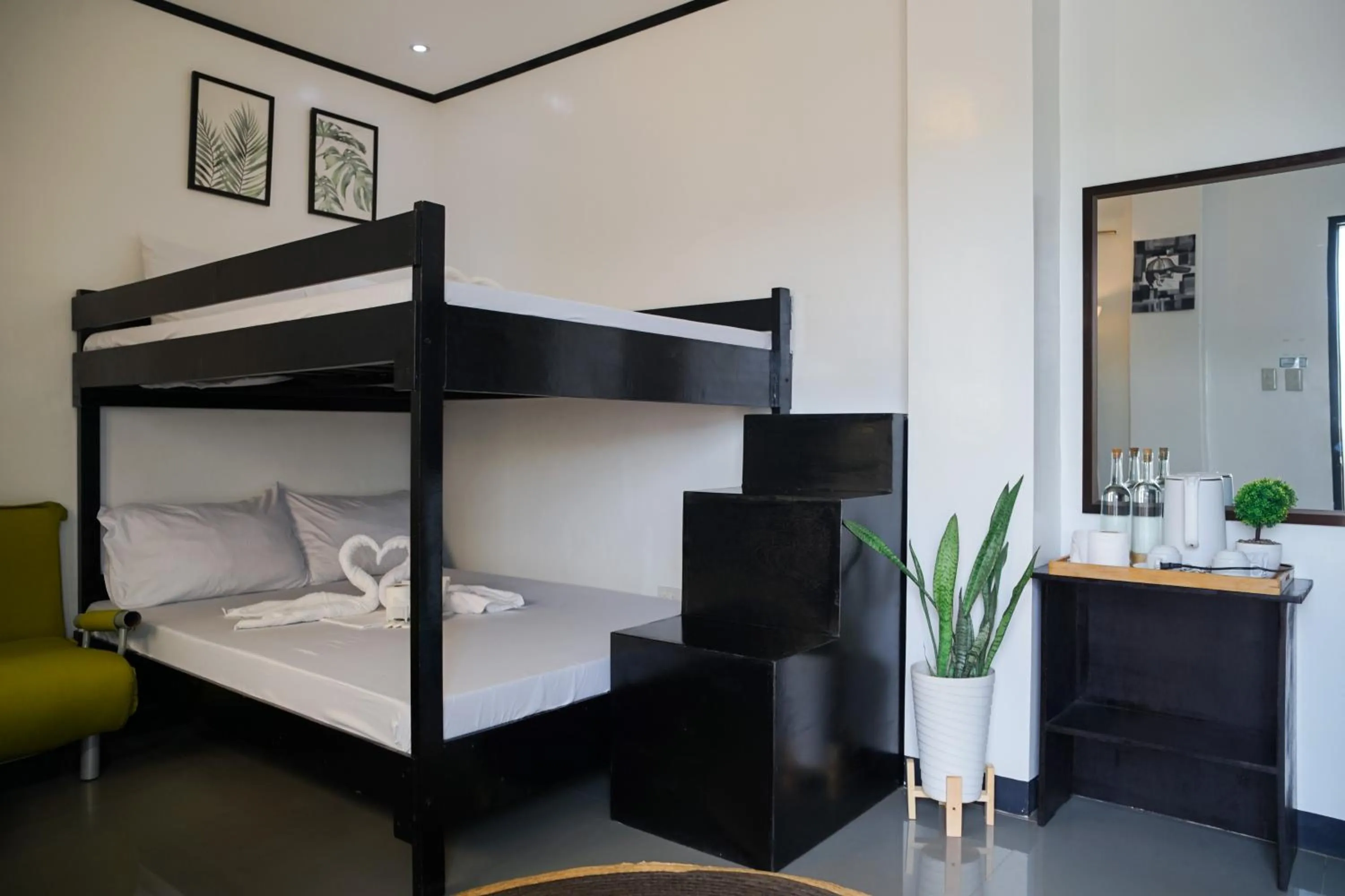 Bed in The Palms Resort & Bar