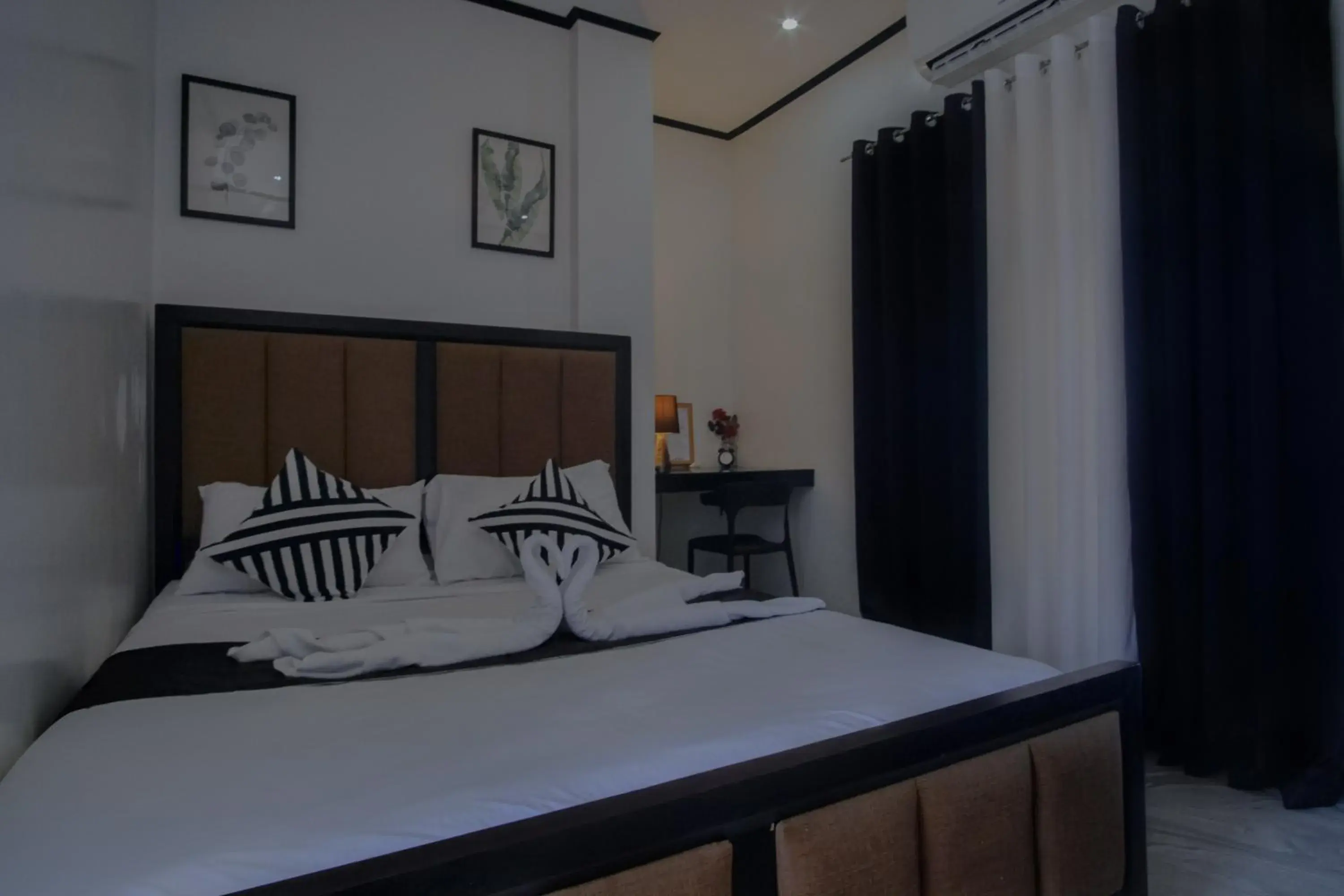 Bed in The Palms Resort & Bar Bed in The Palms Resort & Bar