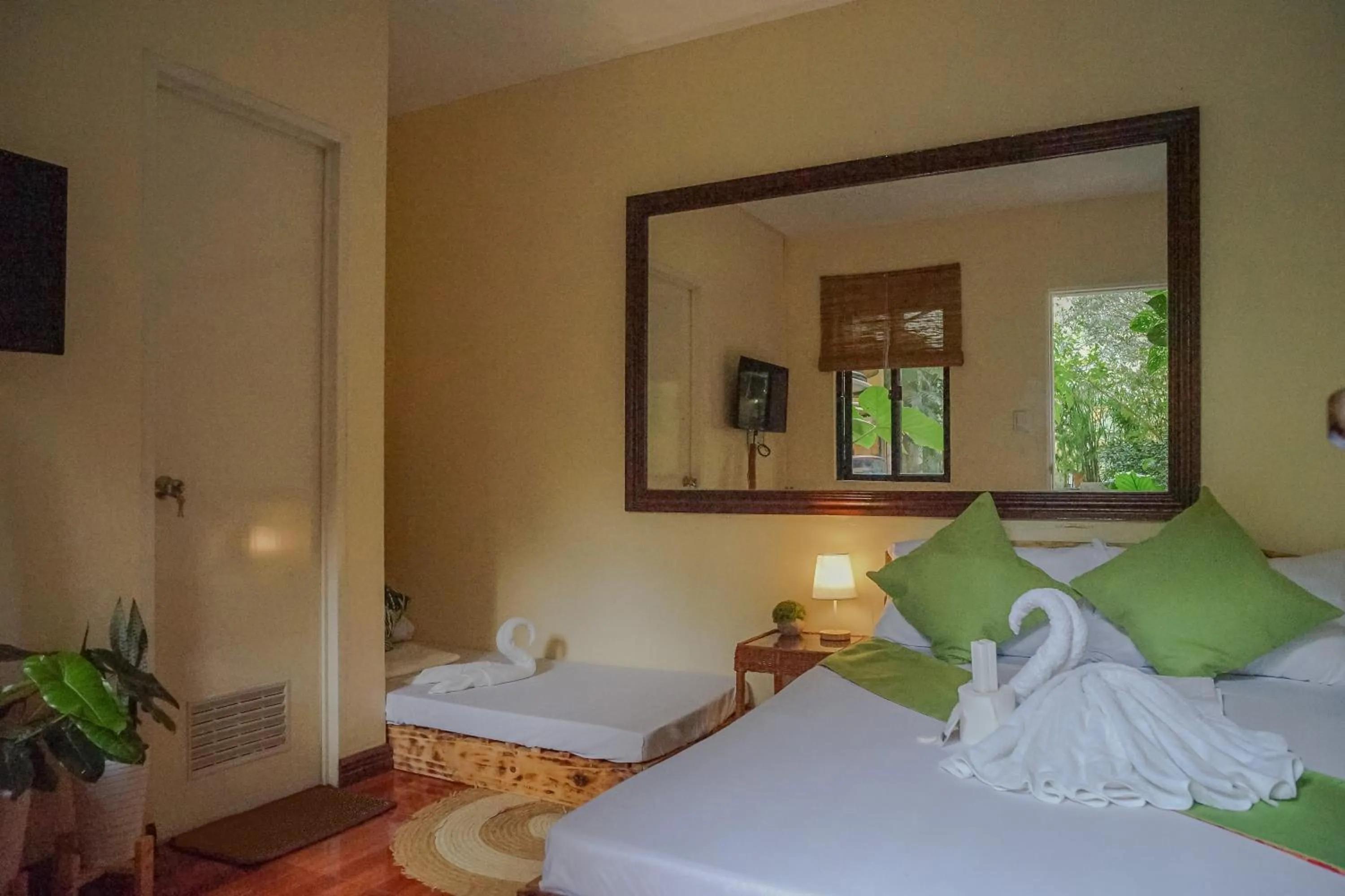 Photo of the whole room, Bed in The Palms Resort & Bar