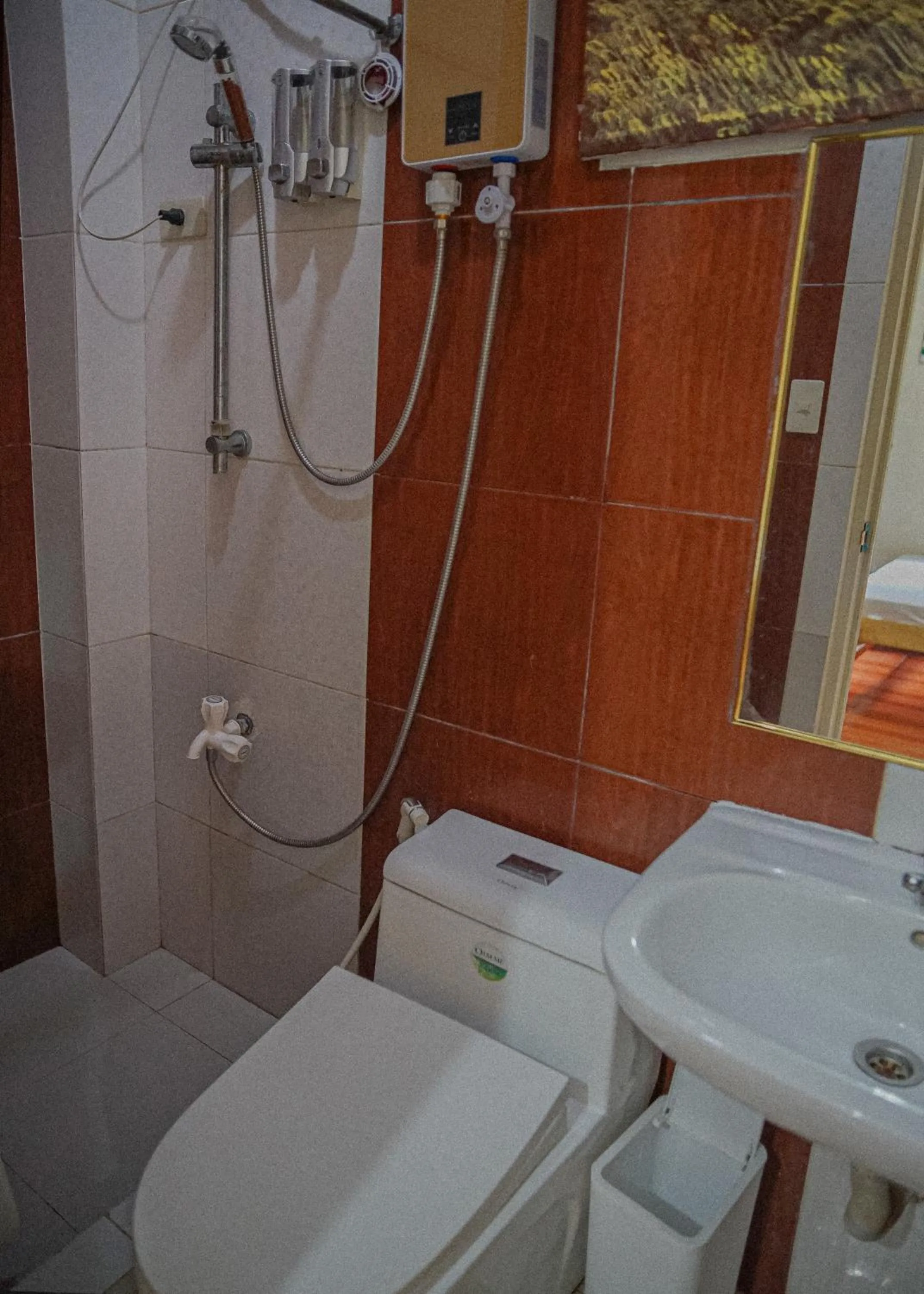 Toilet in The Palms Resort & Bar