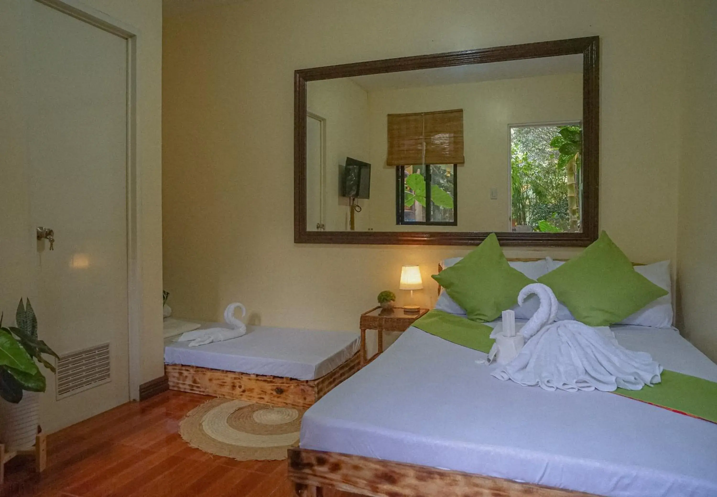 Classic Triple Room in The Palms Resort & Bar Classic Triple Room in The Palms Resort & Bar