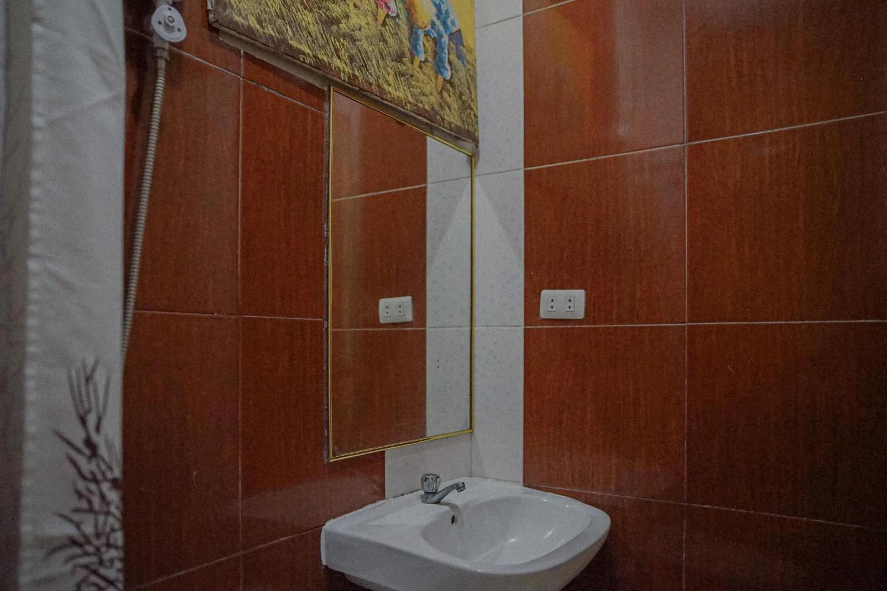 Bathroom in The Palms Resort & Bar