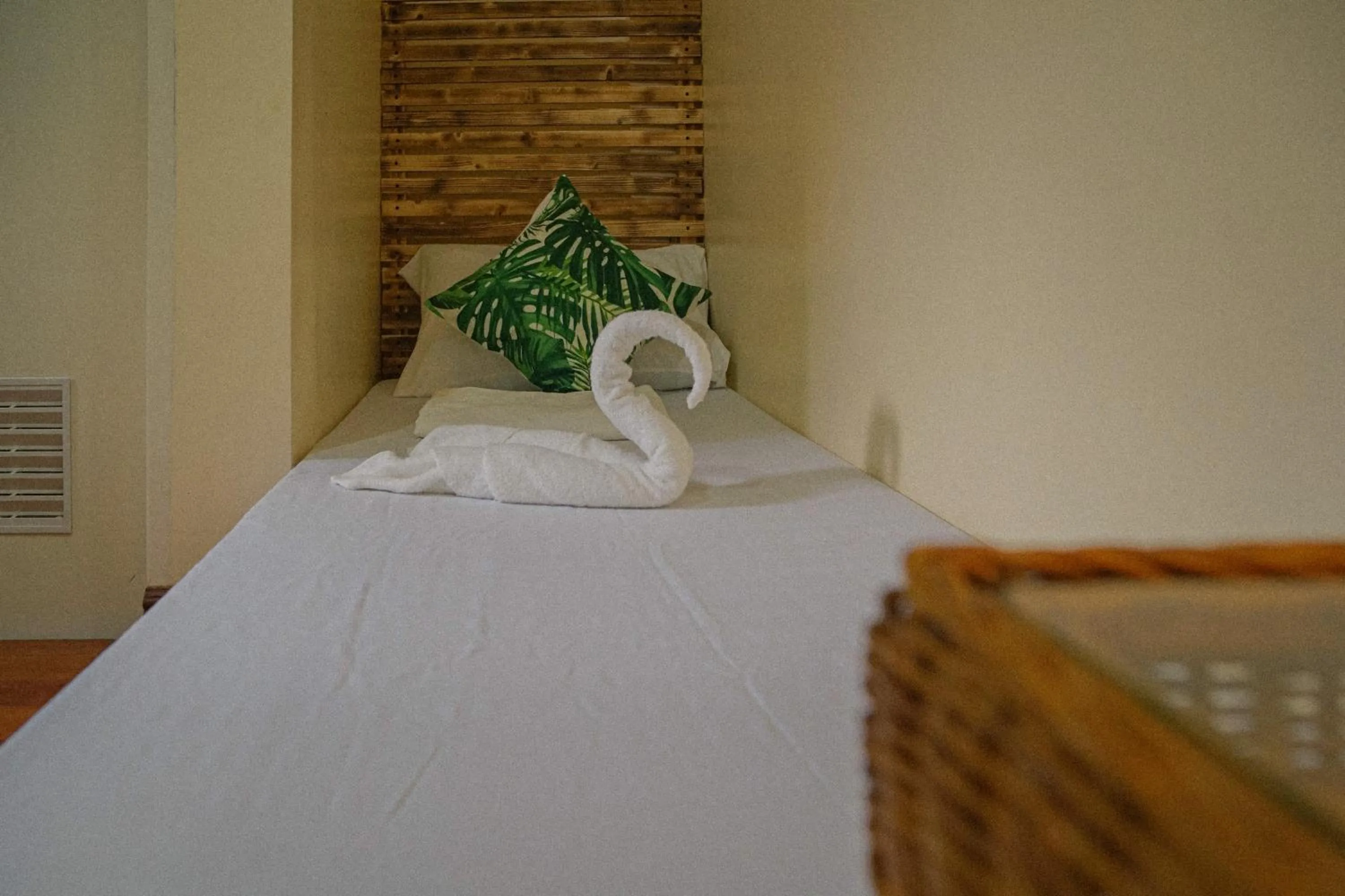 Bed in The Palms Resort & Bar