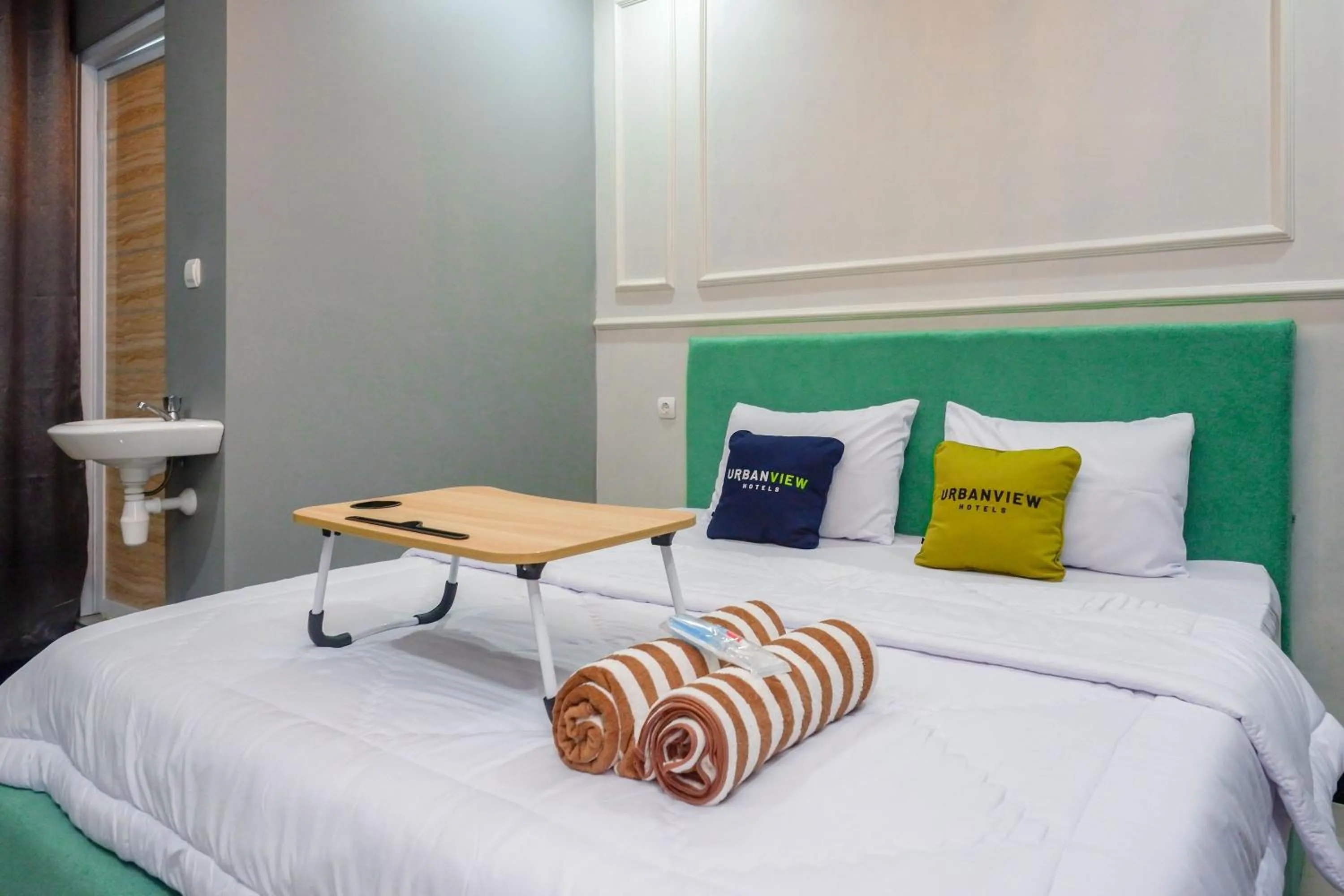 Bedroom, Bed in Urbanview Hotel Umbrella Dieng by RedDoorz