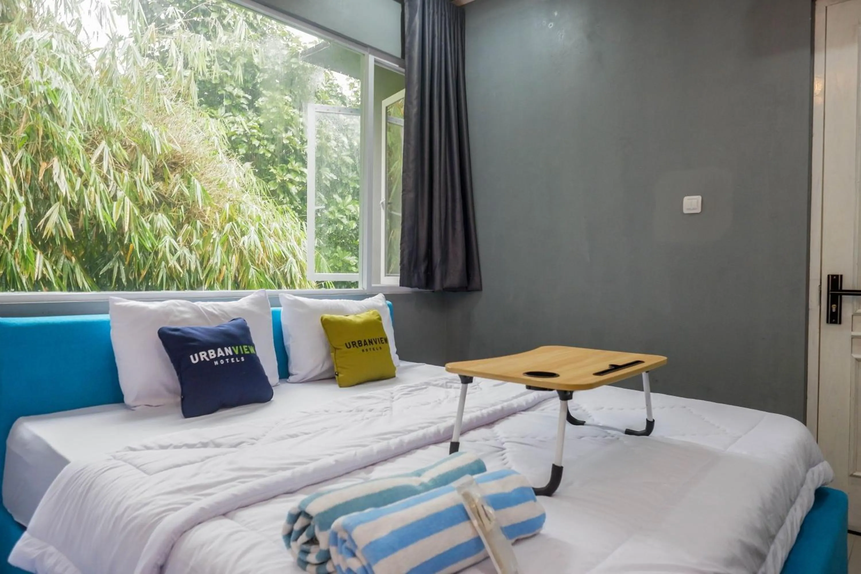 Bedroom, Bed in Urbanview Hotel Umbrella Dieng by RedDoorz