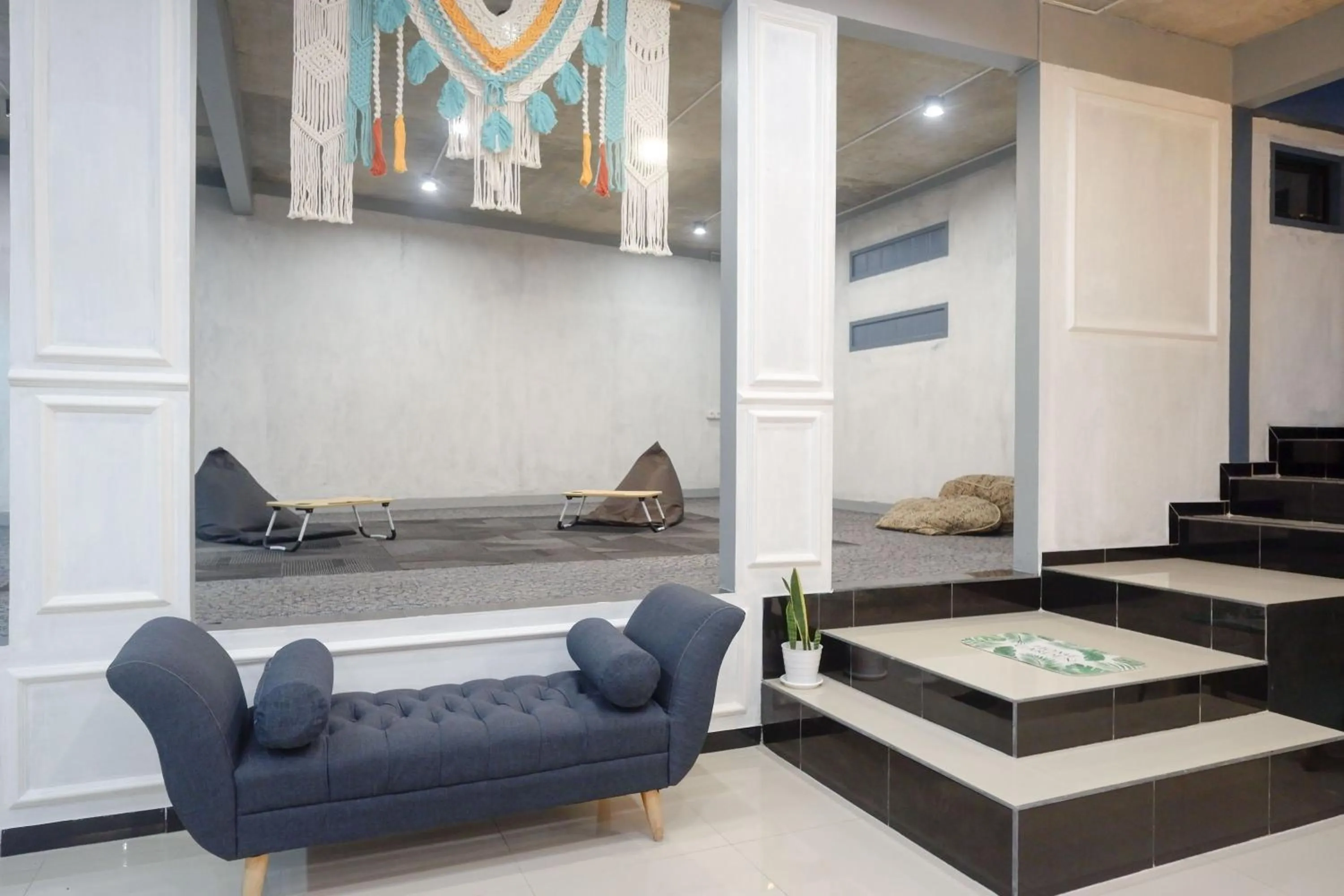 Seating area in Urbanview Hotel Umbrella Dieng by RedDoorz