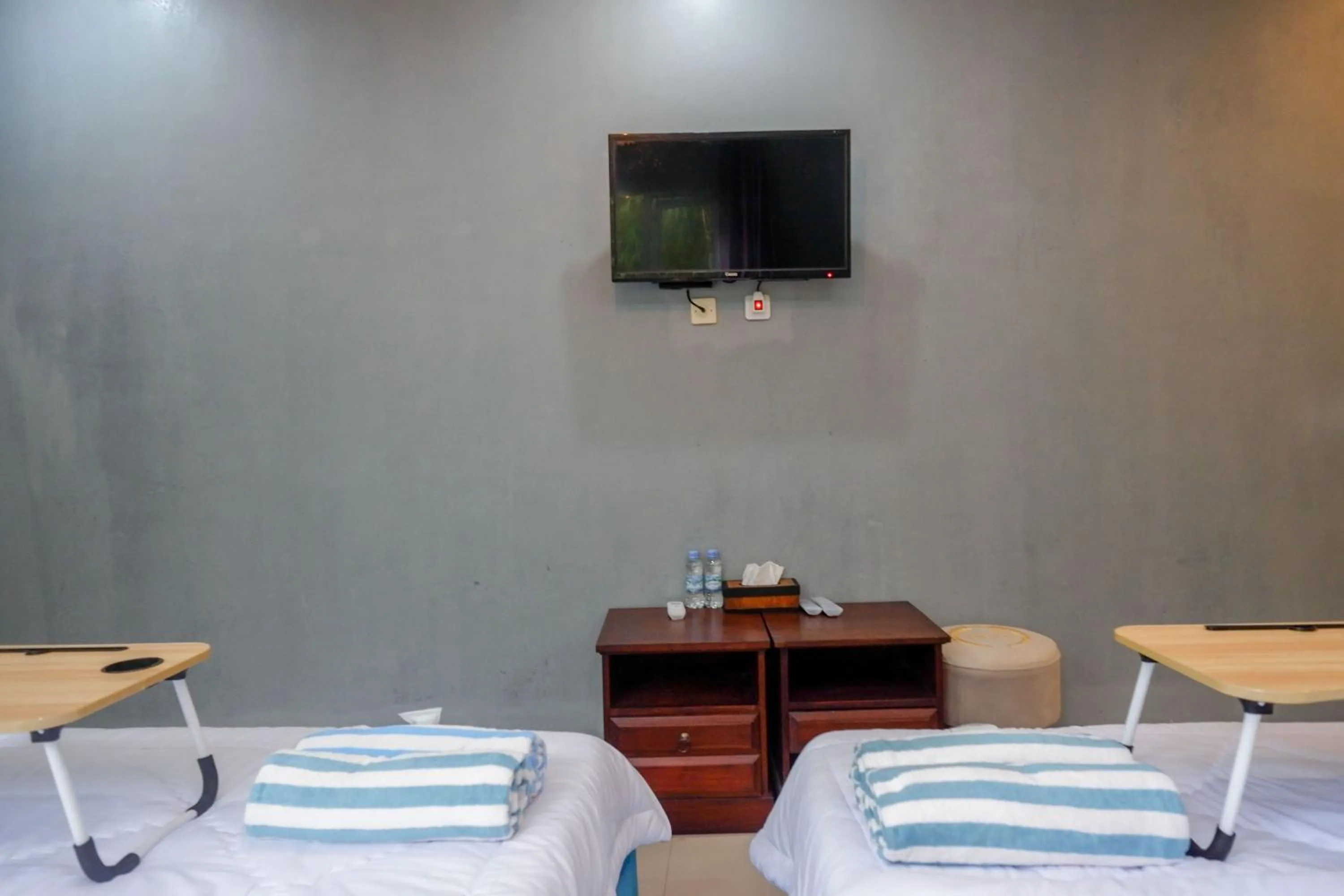 Bedroom, Bed in Urbanview Hotel Umbrella Dieng by RedDoorz