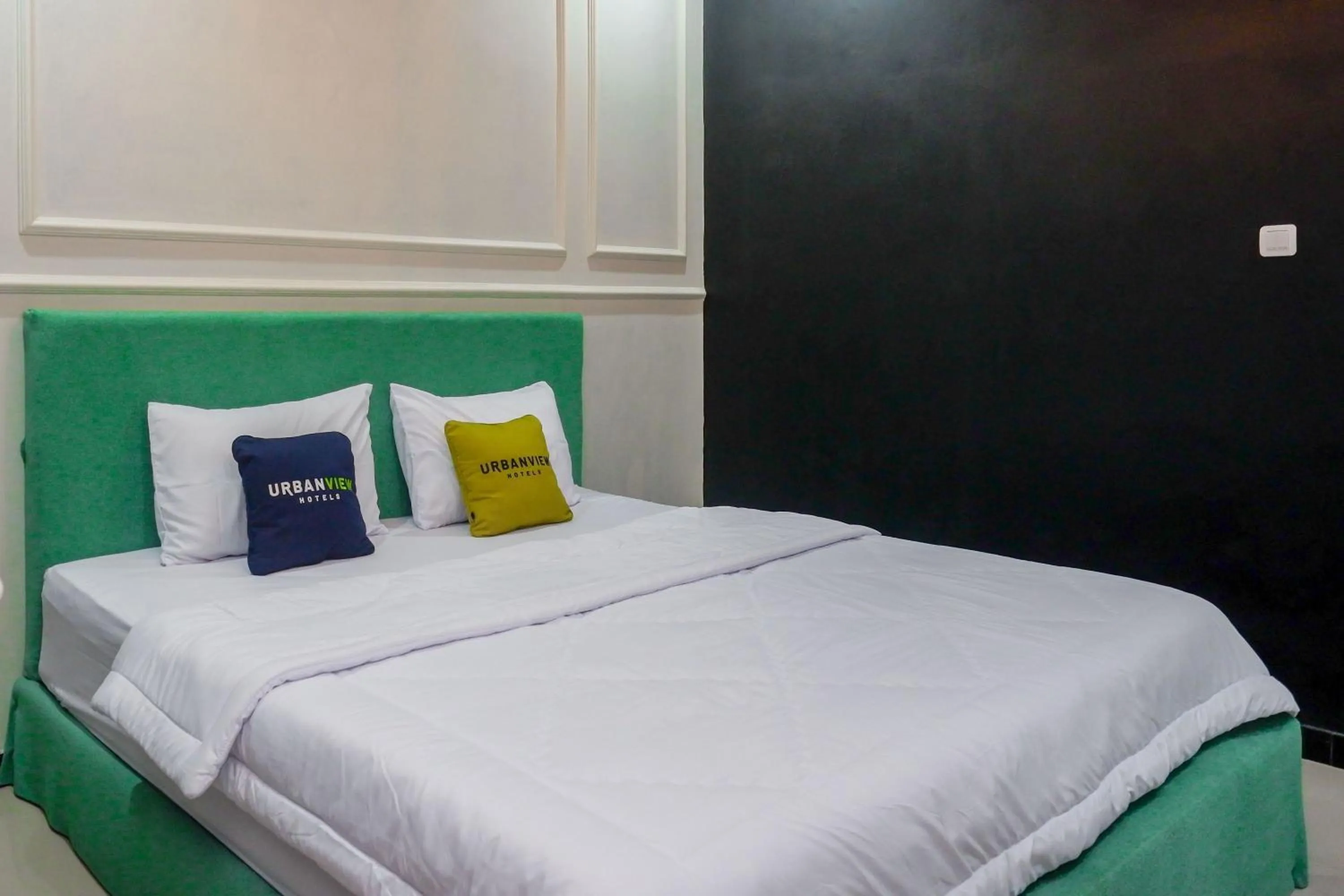 Bed in Urbanview Hotel Umbrella Dieng by RedDoorz