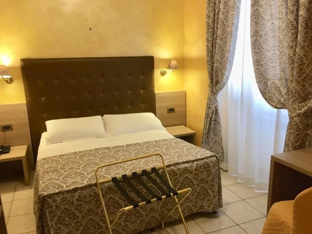 Bed in Hotel Assisi