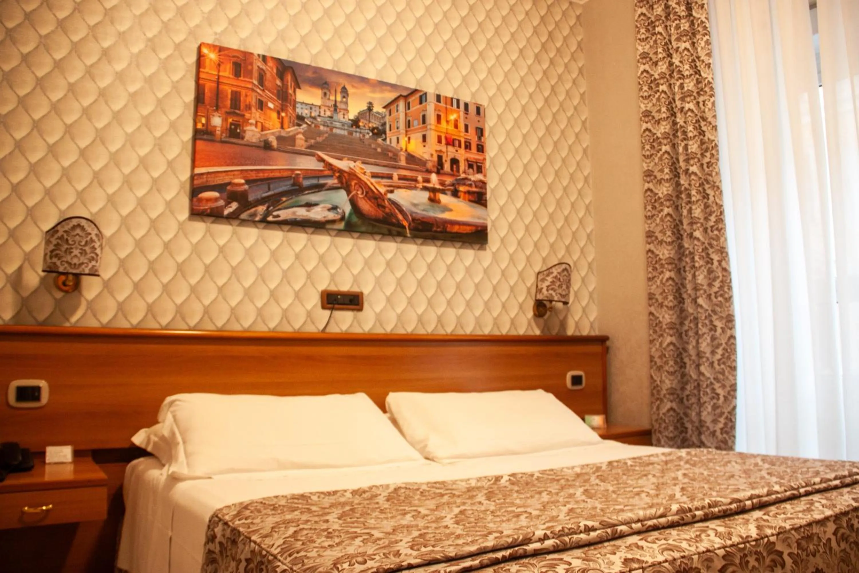 Bed in Hotel Assisi