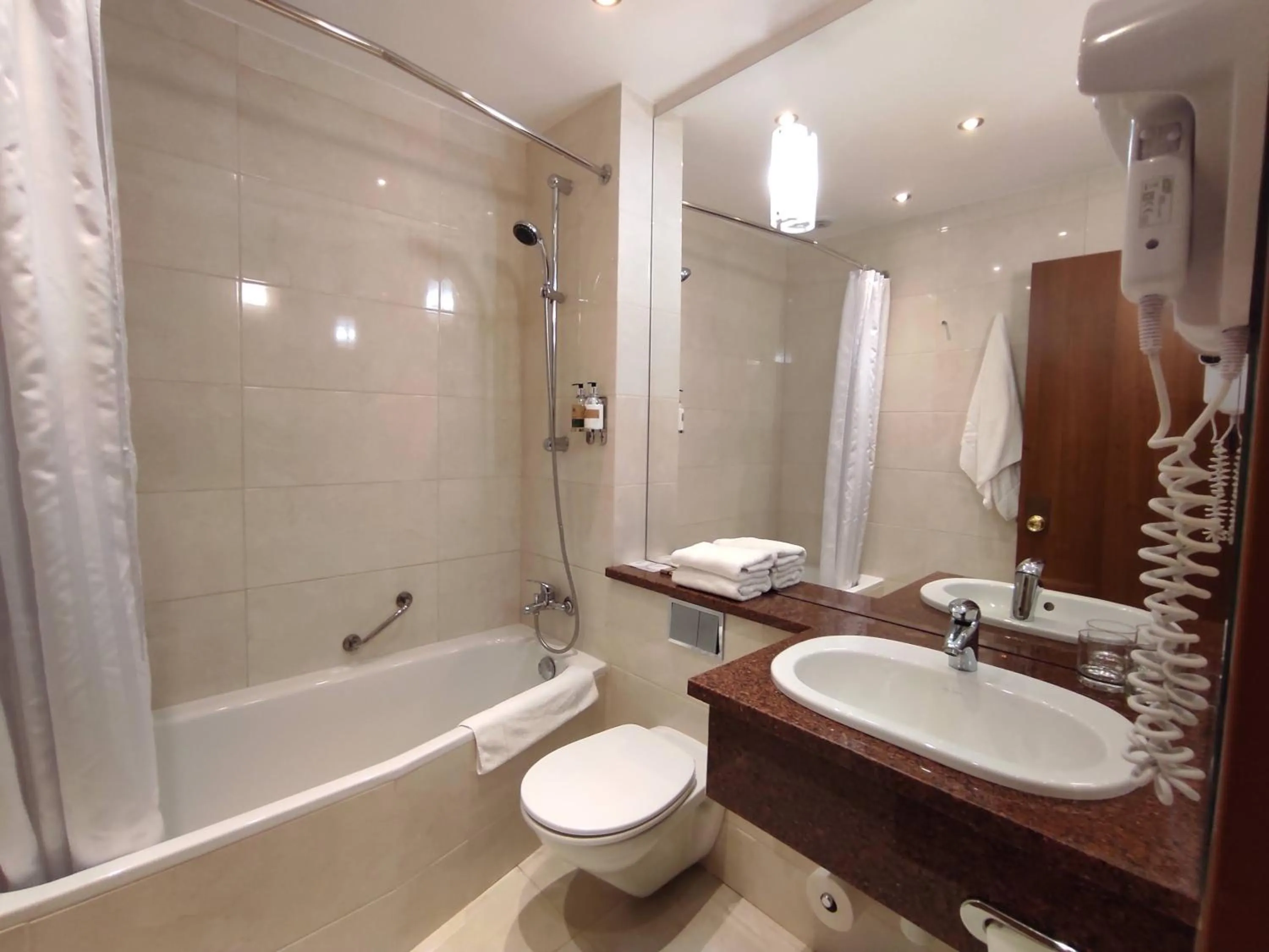 Bathroom in Hotel HP Park Poznań Malta