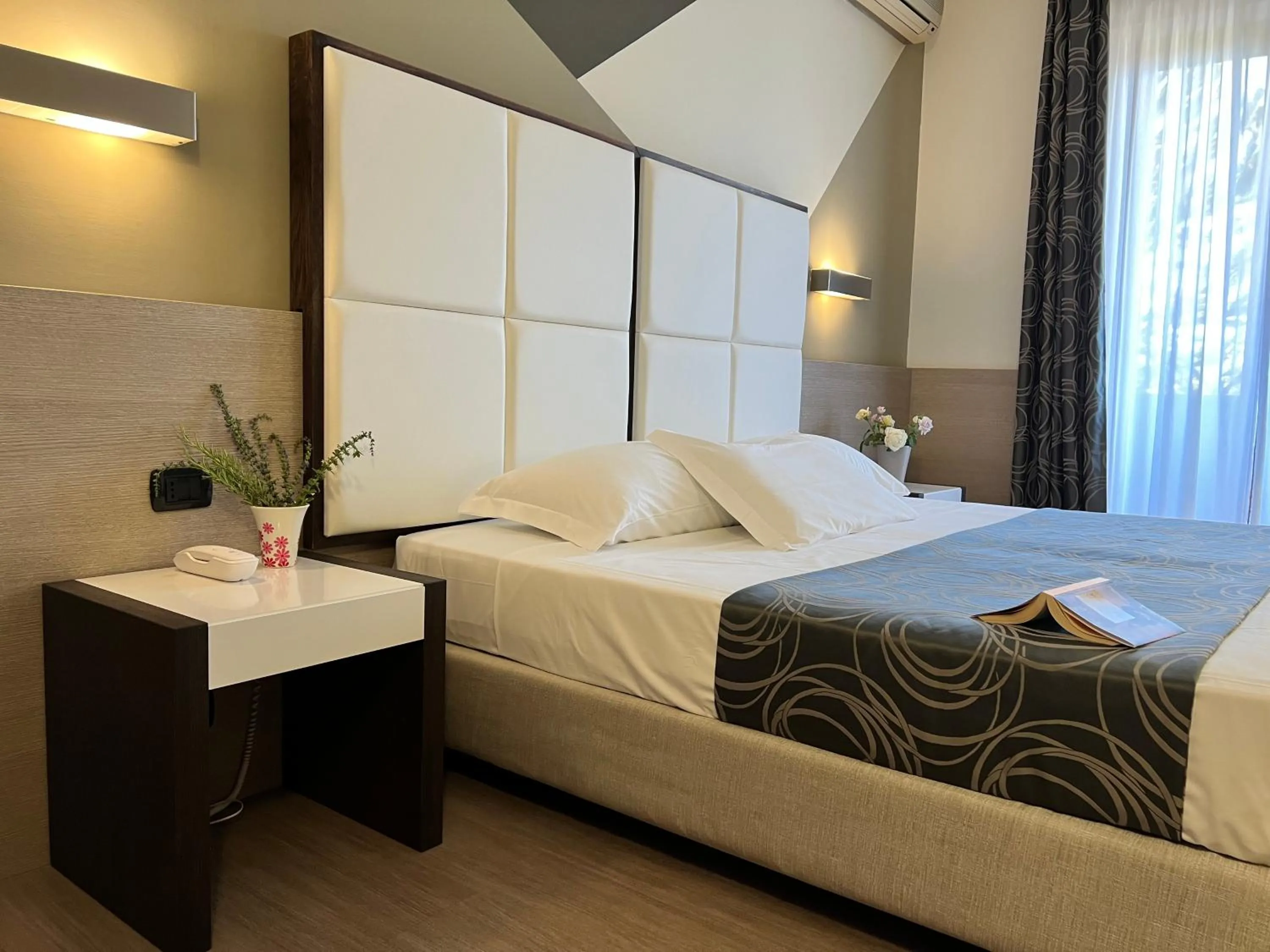 Bed in Hotel Gardenia