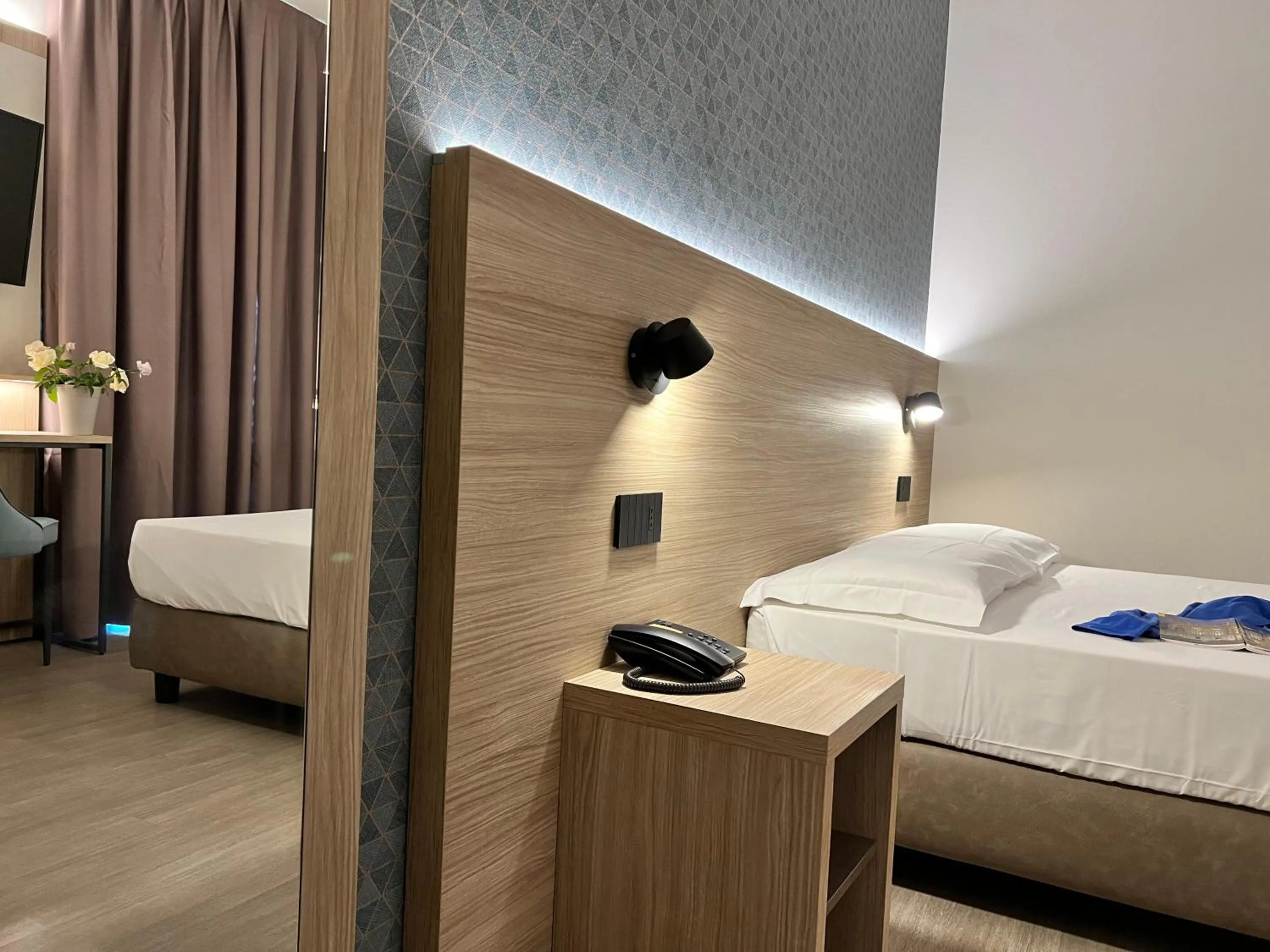 Bed in Hotel Gardenia