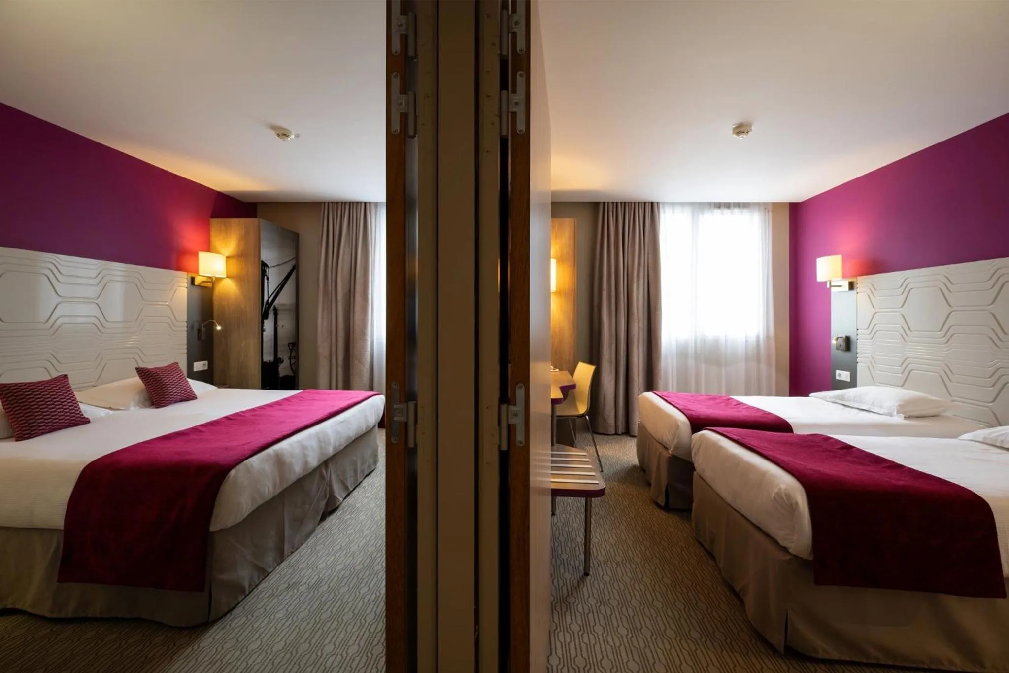 Bed in Kyriad Prestige Saint-Malo