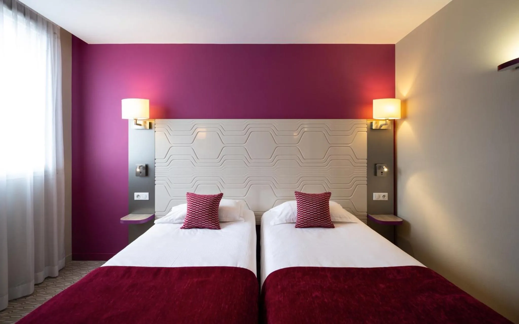 Bed in Kyriad Prestige Saint-Malo